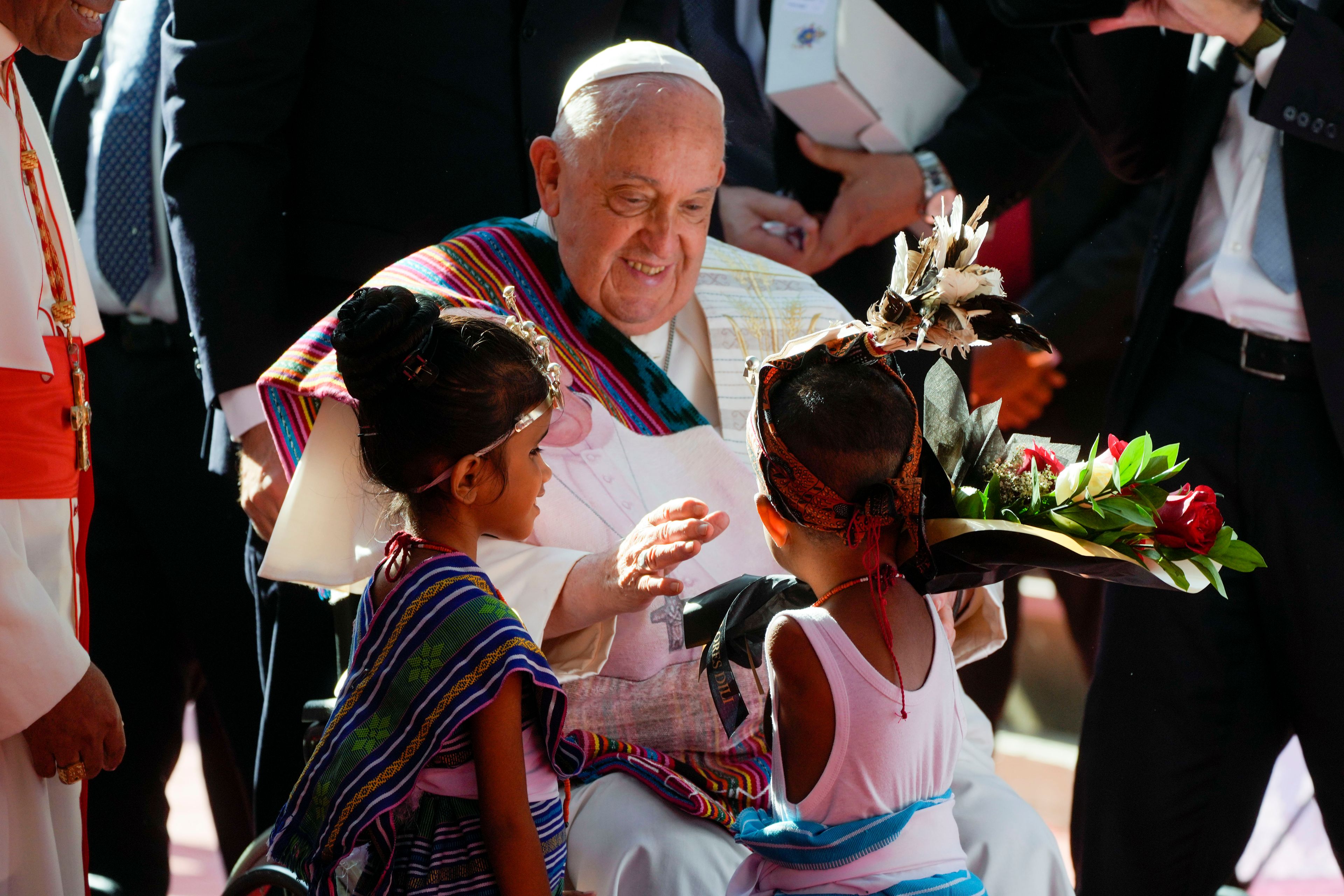 Pope Francis arrives at the 'Irmas ALMA' (Sisters of the Association of Lay Missionaries) School for Children with Disabilities in Dili, East Timor, Tuesday, Sept. 10, 2024. Pope Francis has indirectly acknowledged the abuse scandal in East Timor involving its Nobel Peace Prize-winning independence hero Bishop Carlos Filipe Ximenes Belo. "Let us also not forget that these children and adolescents have their dignity violated," Francis said. "In response, we are all called to do everything possible to prevent every kind of abuse and guarantee a healthy and peaceful childhood for all young people." (AP Photo/Gregorio Borgia)