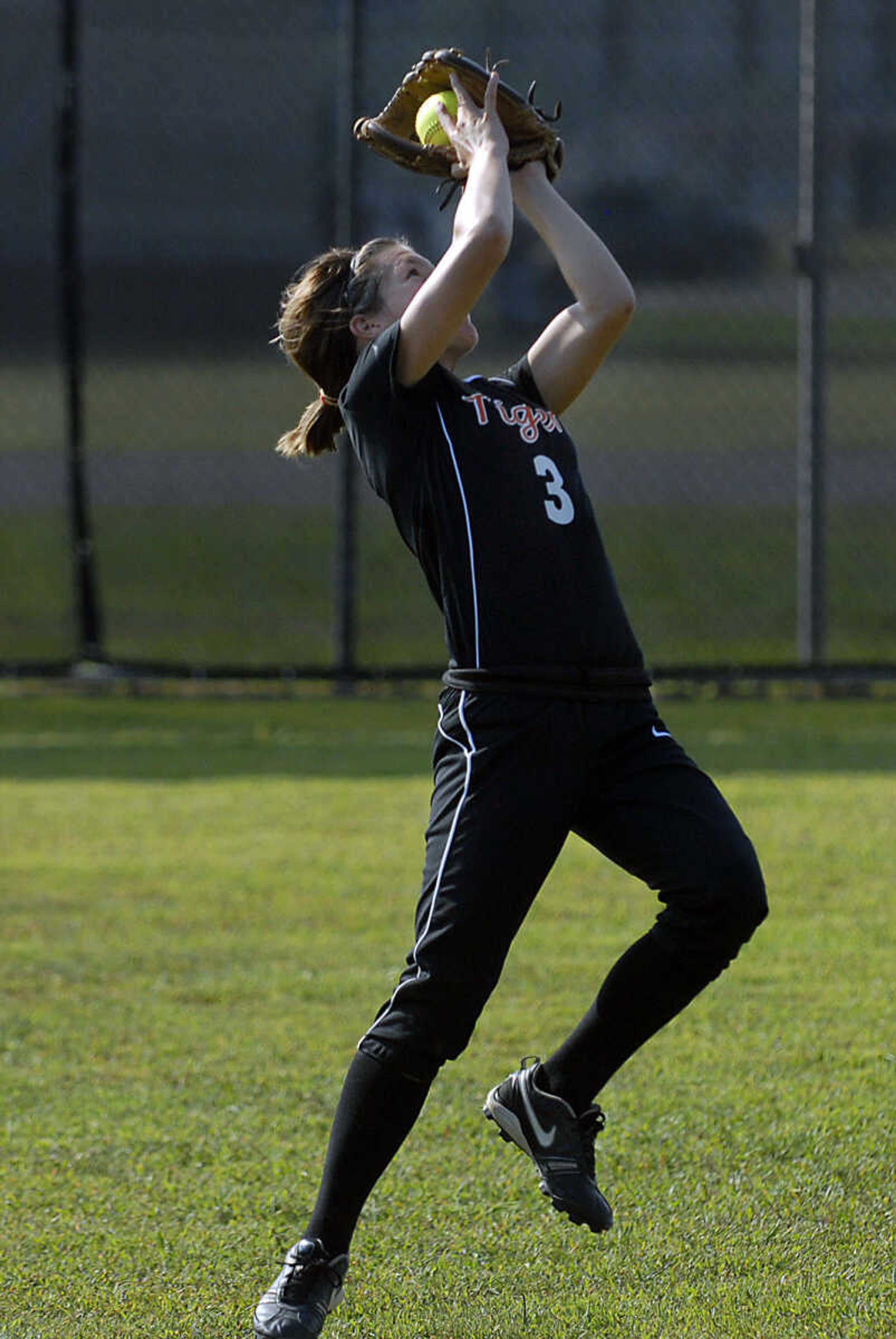 KIT DOYLE ~ kdoyle@semissourian.com
Central left fielder Brooke Baugher makes a dramatic catch Wednesday, September 2, 2009, in Cape Girardeau.