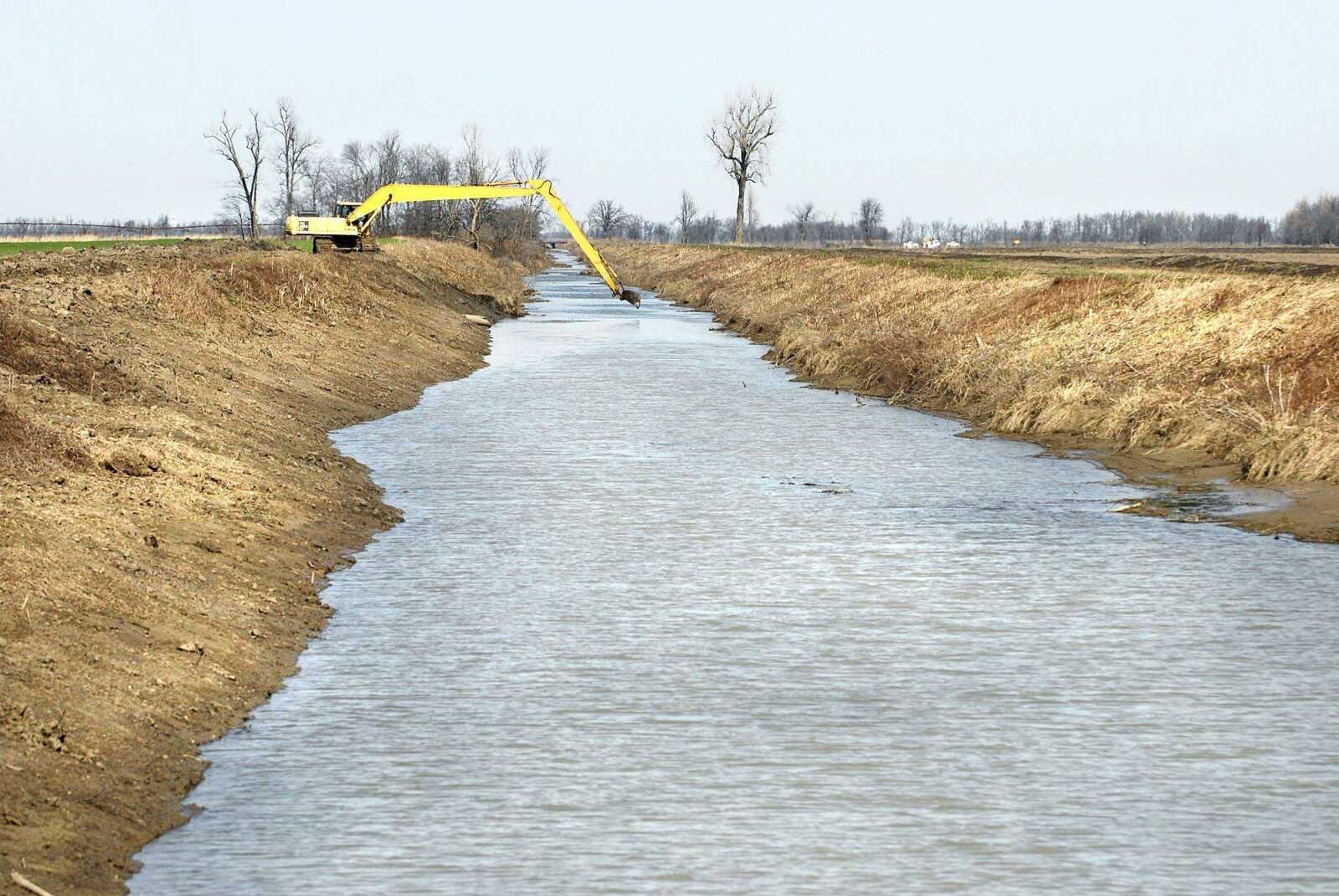 Chad Fodge with Schlosser Construction Co. scoops a load of silt from ditch #29 in Mississippi County Thursday morning, March 1, 2012. The silt is leftover from last May's intentional breach of the Birds Point-New Madrid Floodway. The Southeast Missouri ditch repair is part of the Emergency Watershed Protection Program's $35 million project funded by the The Natural Resources Conservation Service, a branch of the USDA. (Laura Simon)