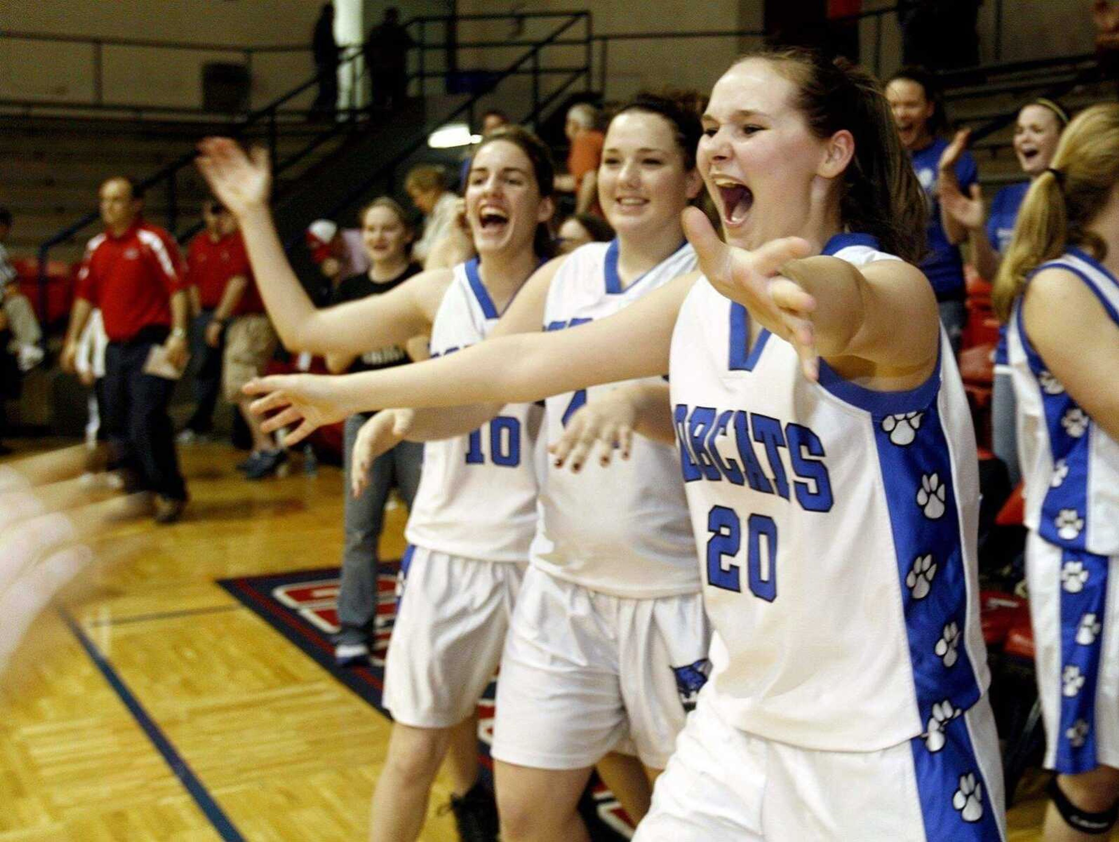 ELIZABETH DODD ~ edodd@semissourian.comDelta's Lynn McQuin celebrates with teammates after the Bobcats beat Tuscumbia 43-40 in a Class 1 sectional game Tuesday at Park Hills Central.