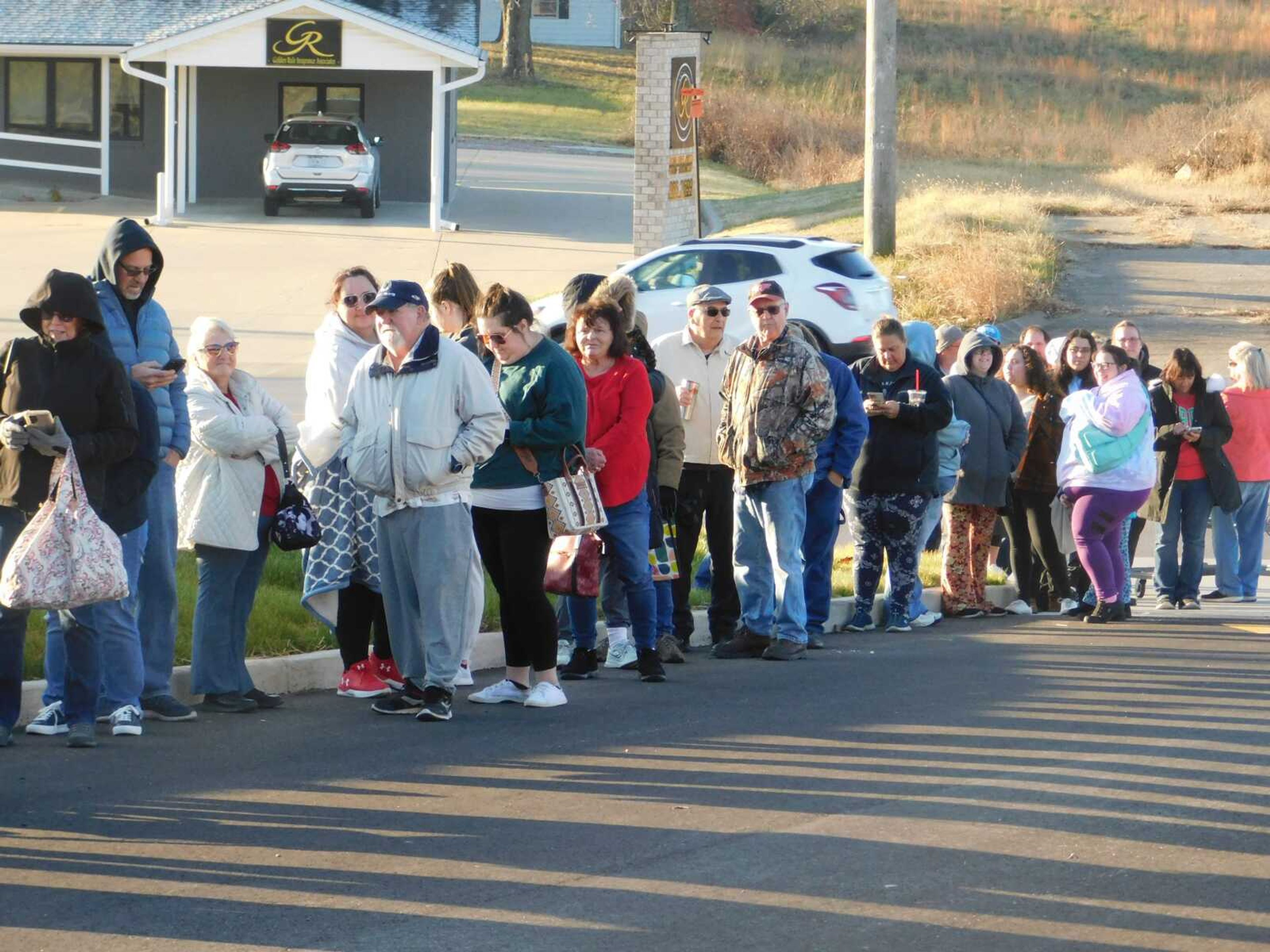 Scores of shoppers braved the cold Thursday to line up before ALDI opened Thursday, Dec. 7 in Jackson. The first 100 customers in line received a gift bag of select ALDI products.