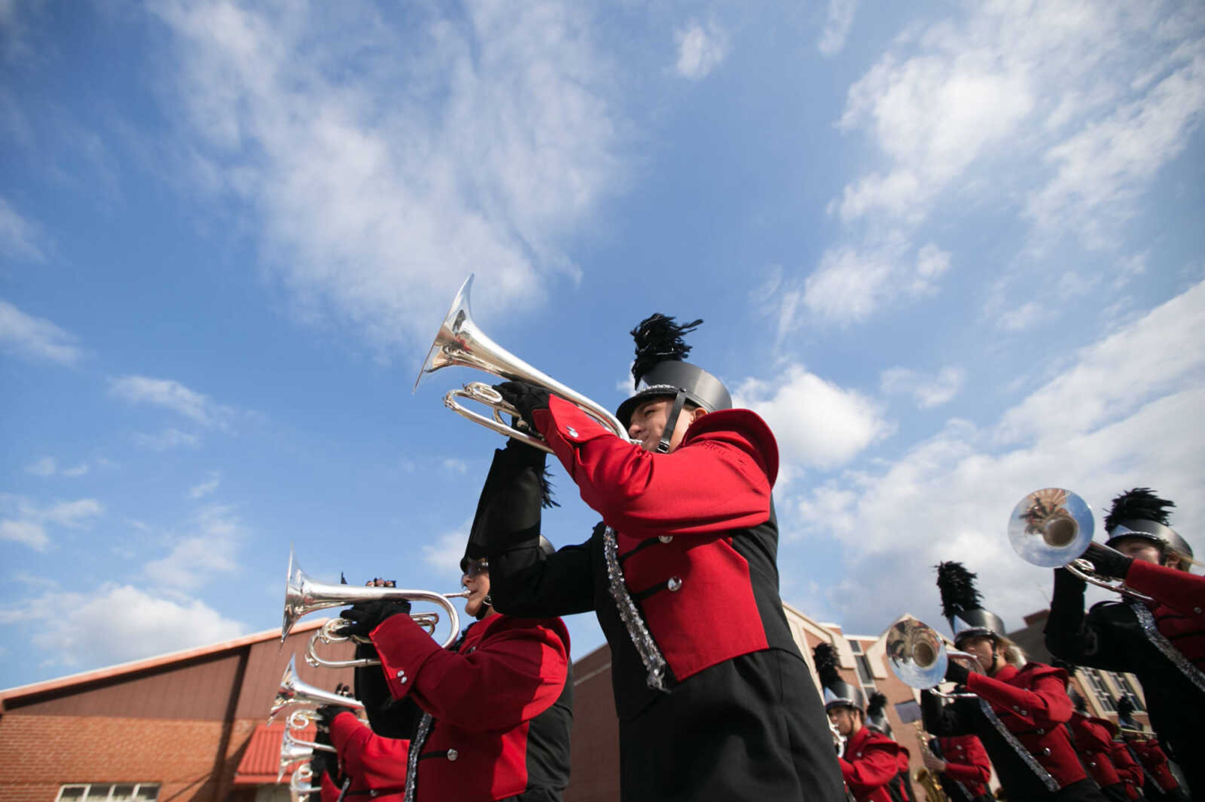 GLENN LANDBERG ~ glandberg@semissourian.com

Members of the Jackson High School Marching Chiefs move in formation down High Street in Uptown Jackson during the Jackson Band Festival parade Tuesday, Oct. 6, 2015.