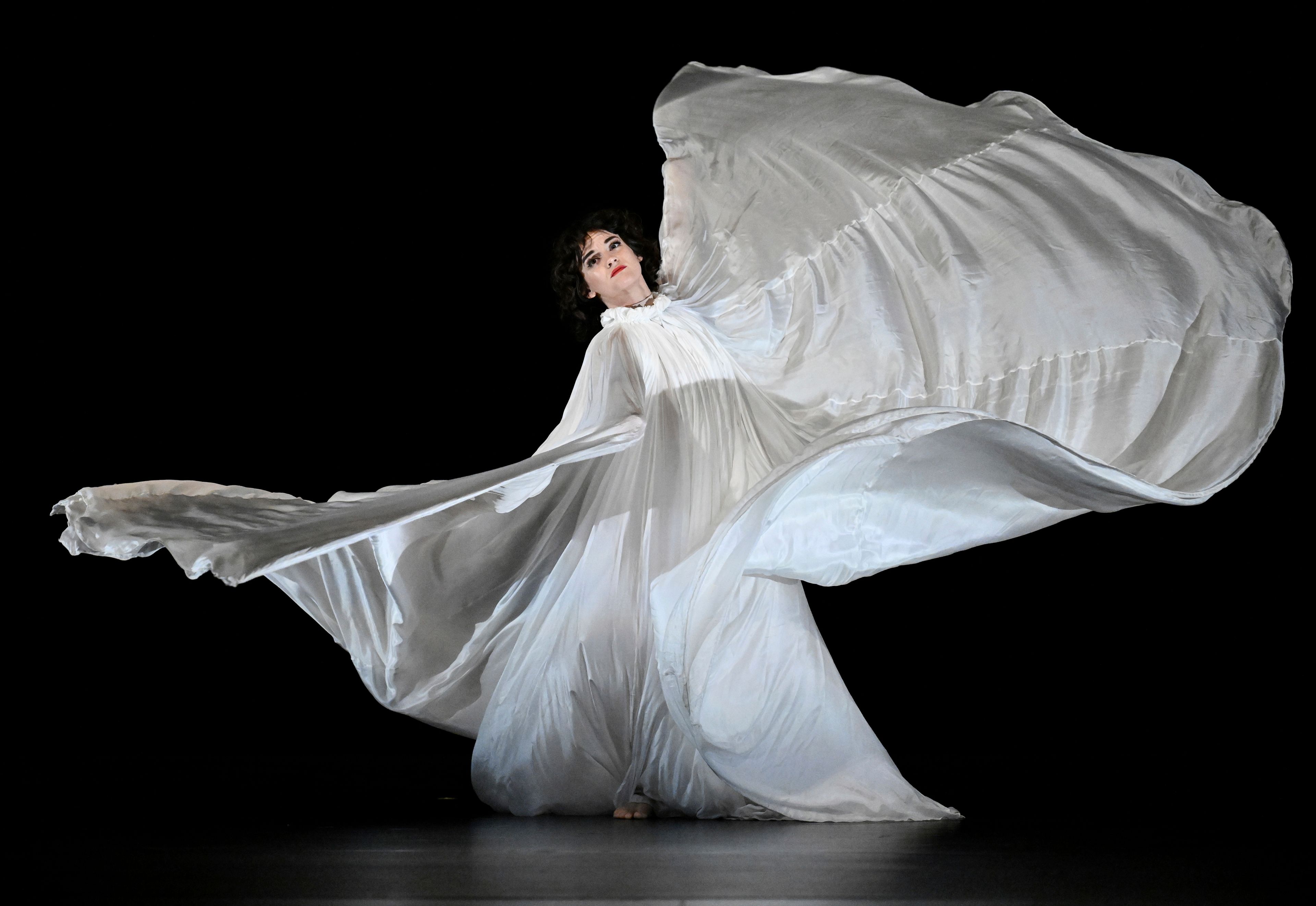 Paul Taylor Dance Company dress rehearsal performance of Jody Sperling's "Clair de Lune" featuring dancer Emmy Wildermuth at the David H. Koch Theater at Lincoln Center Wednesday, Nov. 13, 2024, in New York. (Photo by Evan Agostini/Invision/AP)