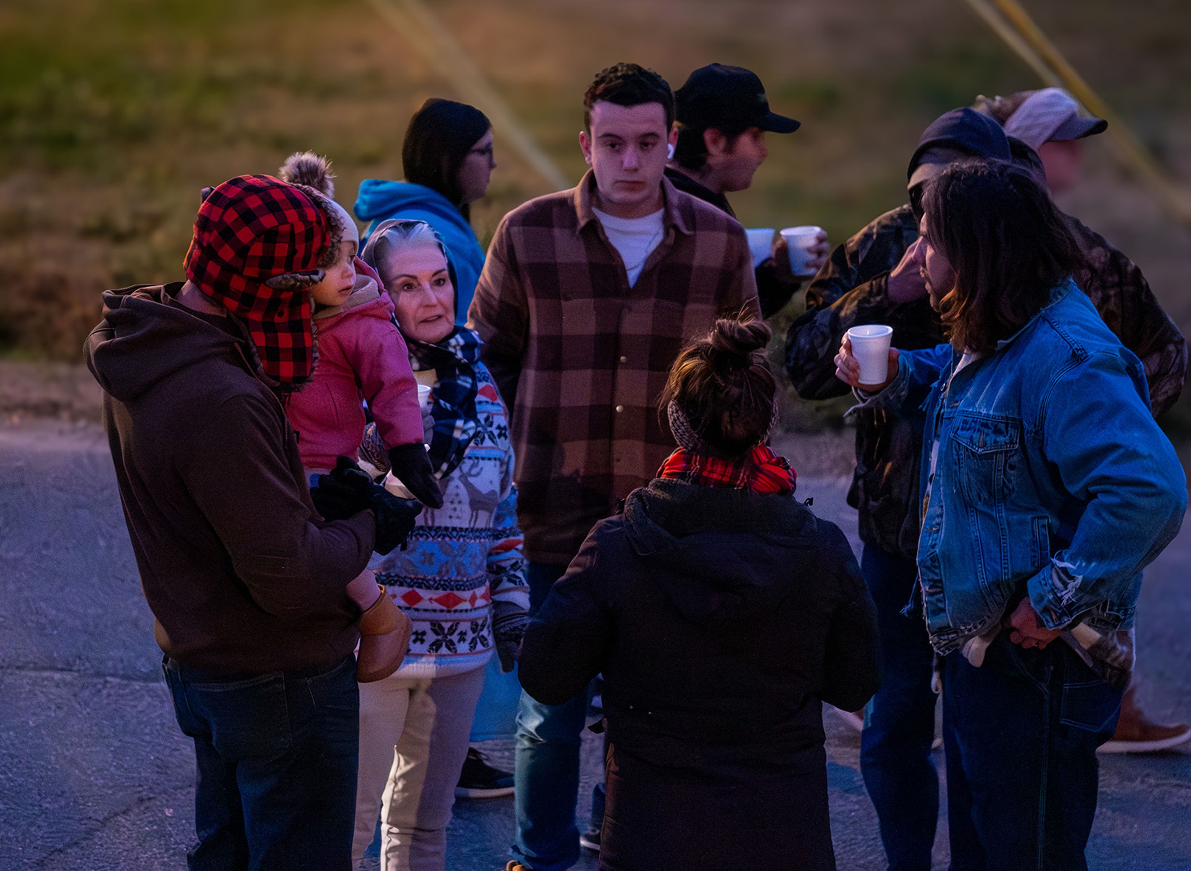 Community members gather in cozy attire to celebrate the start of the holiday season.
