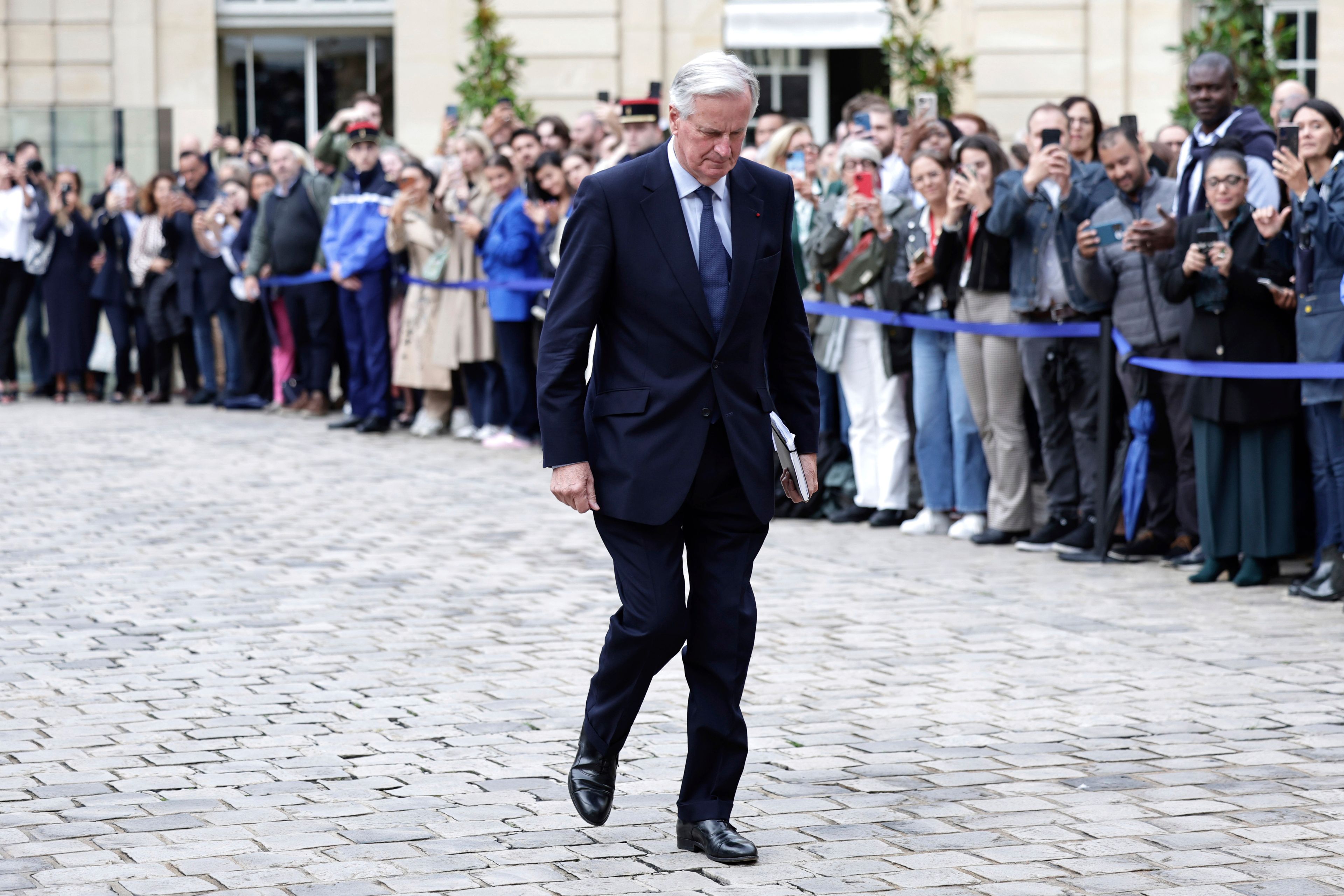 New French prime minister Michel Barnier, arrives for the handover ceremony, Thursday, Sept. 5, 2024 in Paris. President Emmanuel Macron has named EU's Brexit negotiator Michel Barnier as France's new prime minister after more than 50 days of caretaker government. (Stephane de Sakutin/Pool Photo via AP)