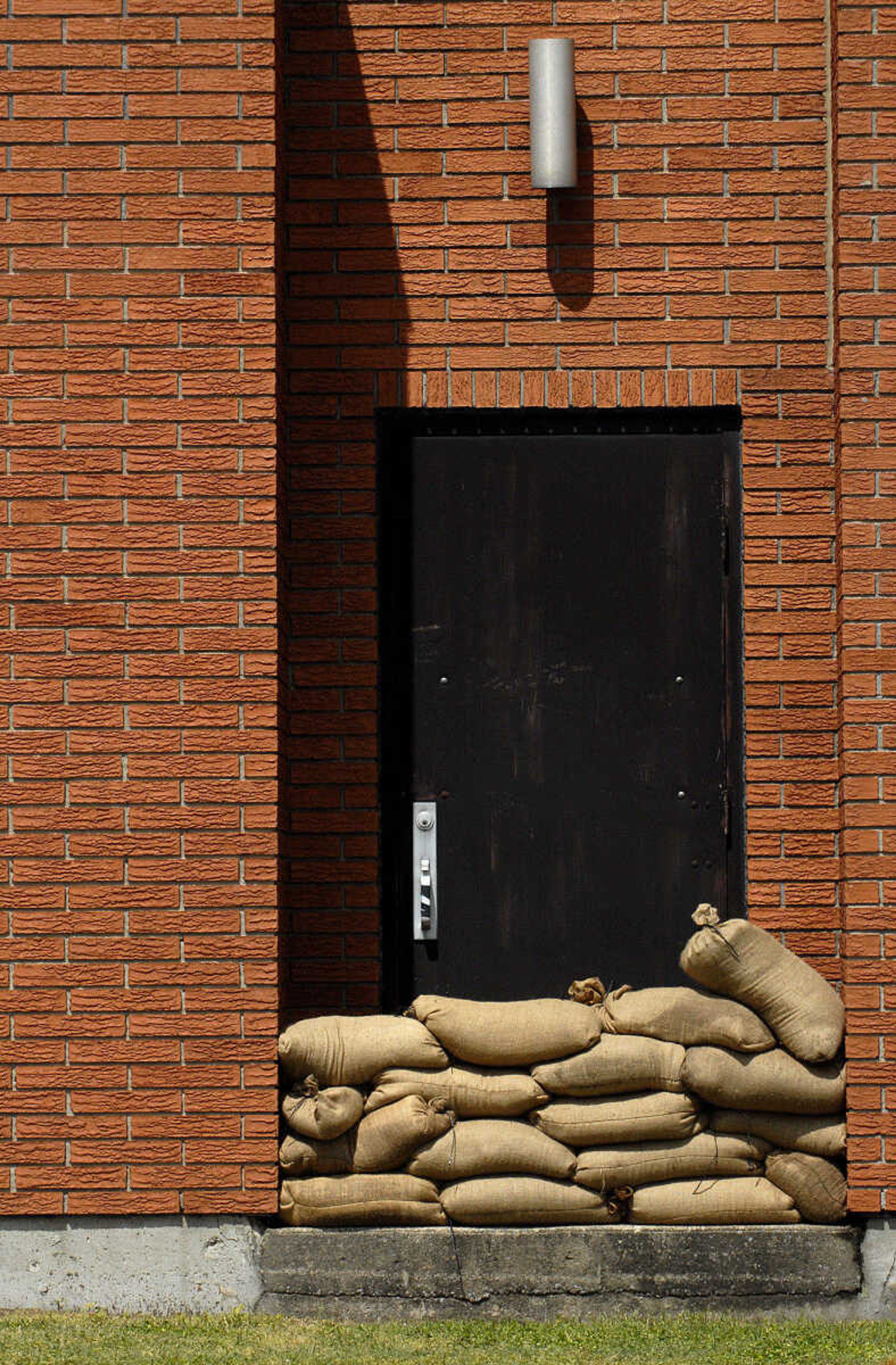 LAURA SIMON~lsimon@semissourian.com
Sandbags are stacked up in a doorway to Red Star Baptist Church off of  Main Street Thursday, April 28, 2011 in Cape Girardeau.