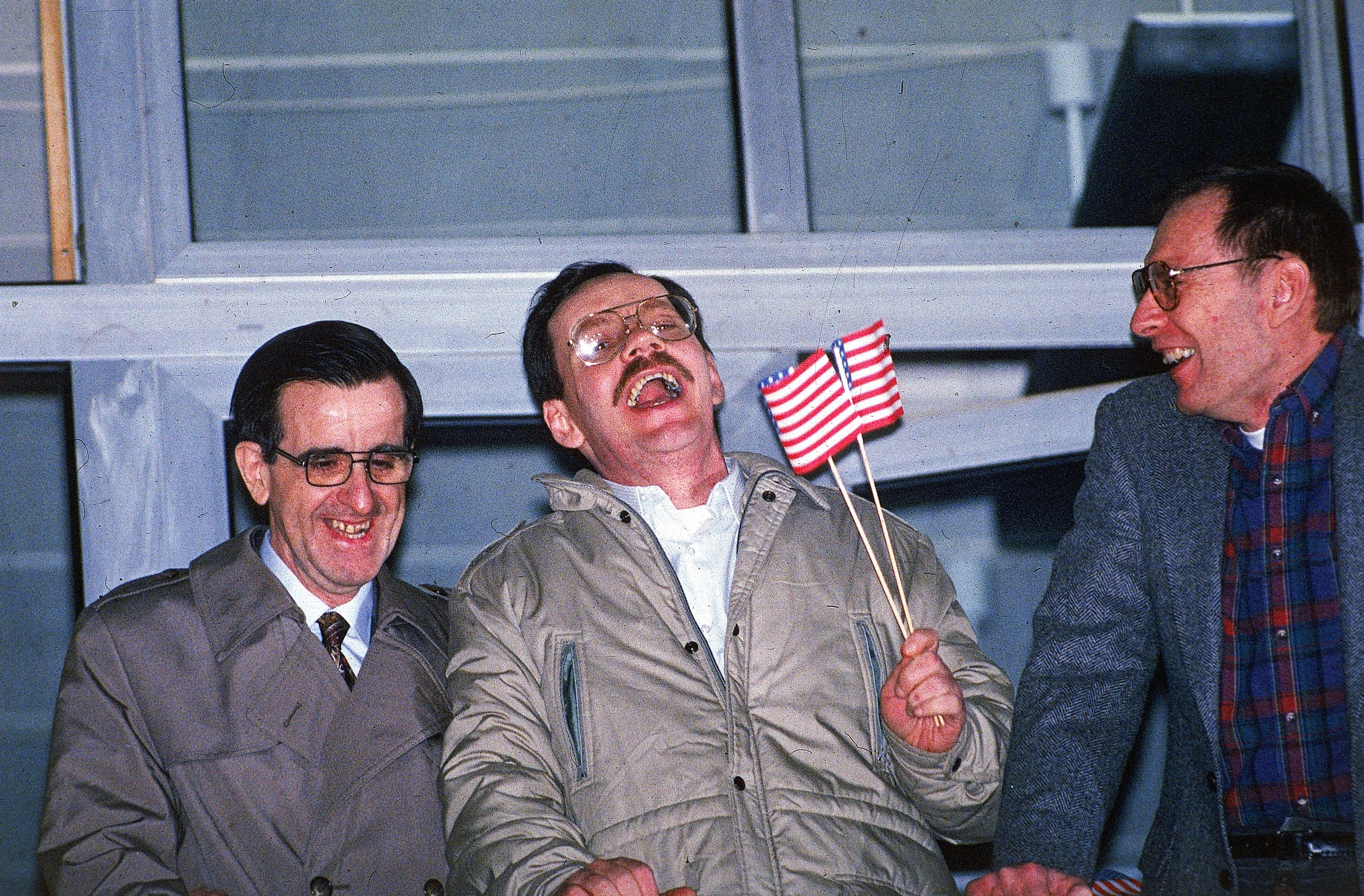 Three former U.S. hostages, from left, Joseph Cicippio, AP chief Middle East correspondent Terry Anderson, and Alann Steen enjoy a light moment shortly after Anderson's arrival at the Wiesbaden Air Force hospital early Thursday, Dec. 5, 1991. 