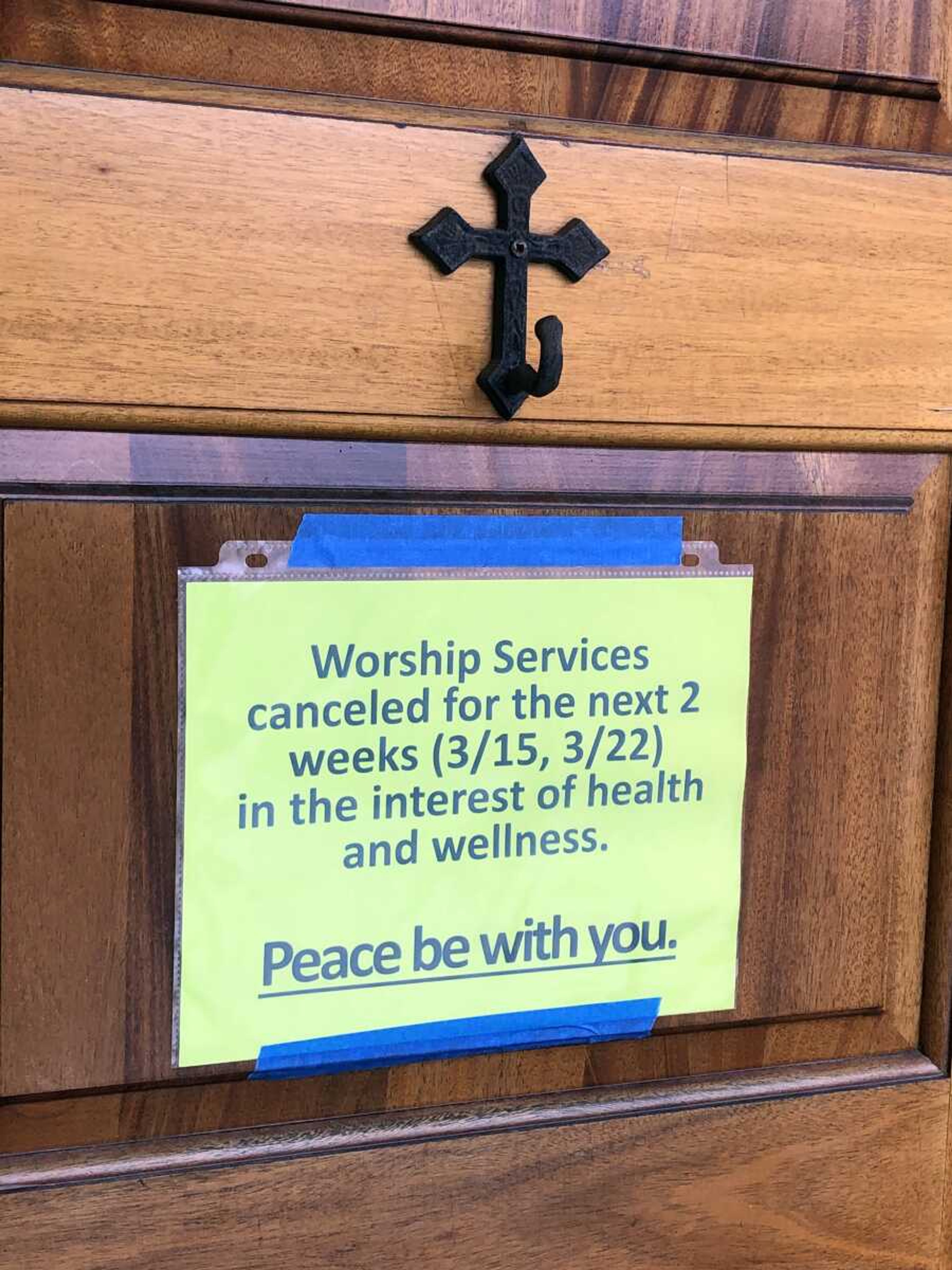 A sign announcing services have been canceled because of coronavirus concerns is seen Sunday on the door of First Presbyterian Church in Cape Girardeau.