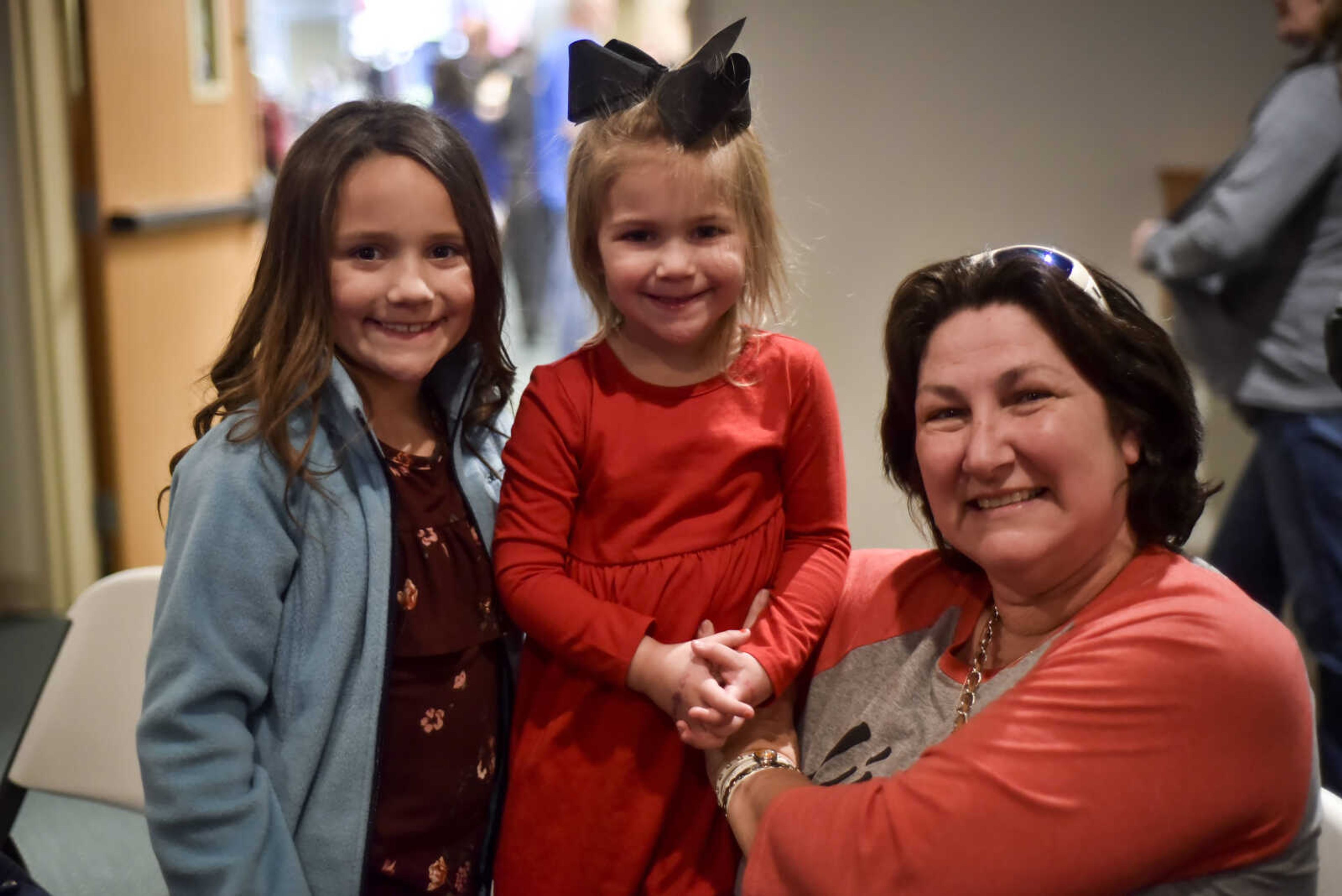 Jan Powell poses for a photo with her granddaughters Kylie, 8, left, and Aveliana Kimbrel, 4, center, during a Big Daddy Weave concert Wednesday, March 14, 2018, at Cape Bible Chapel in Cape Girardeau.