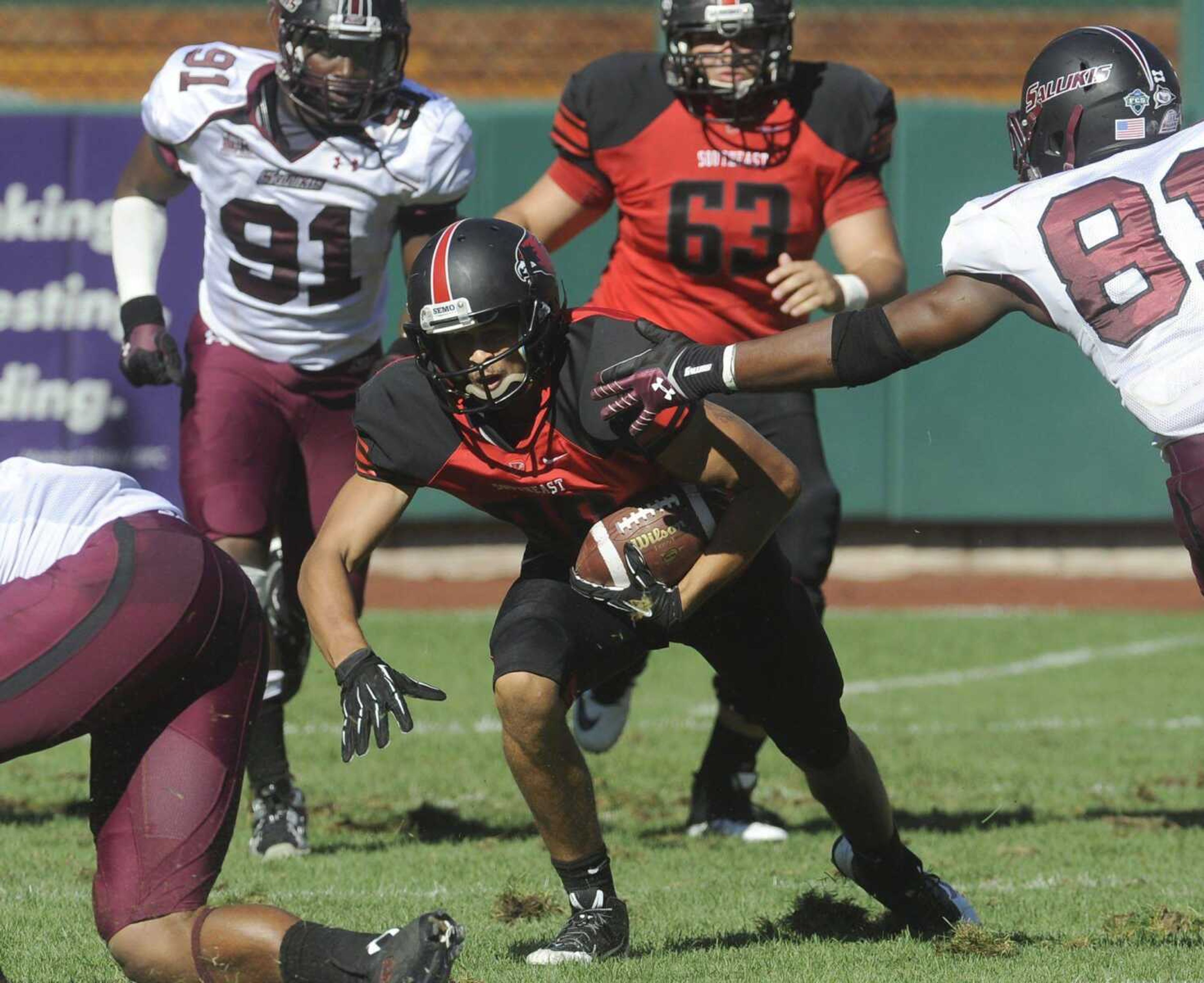 Southeast Missouri State&#8217;s D.J. Foster carries after a reception against Southern Illinois during the fourth quarter Saturday at Busch Stadium in St. Louis. (Fred Lynch)