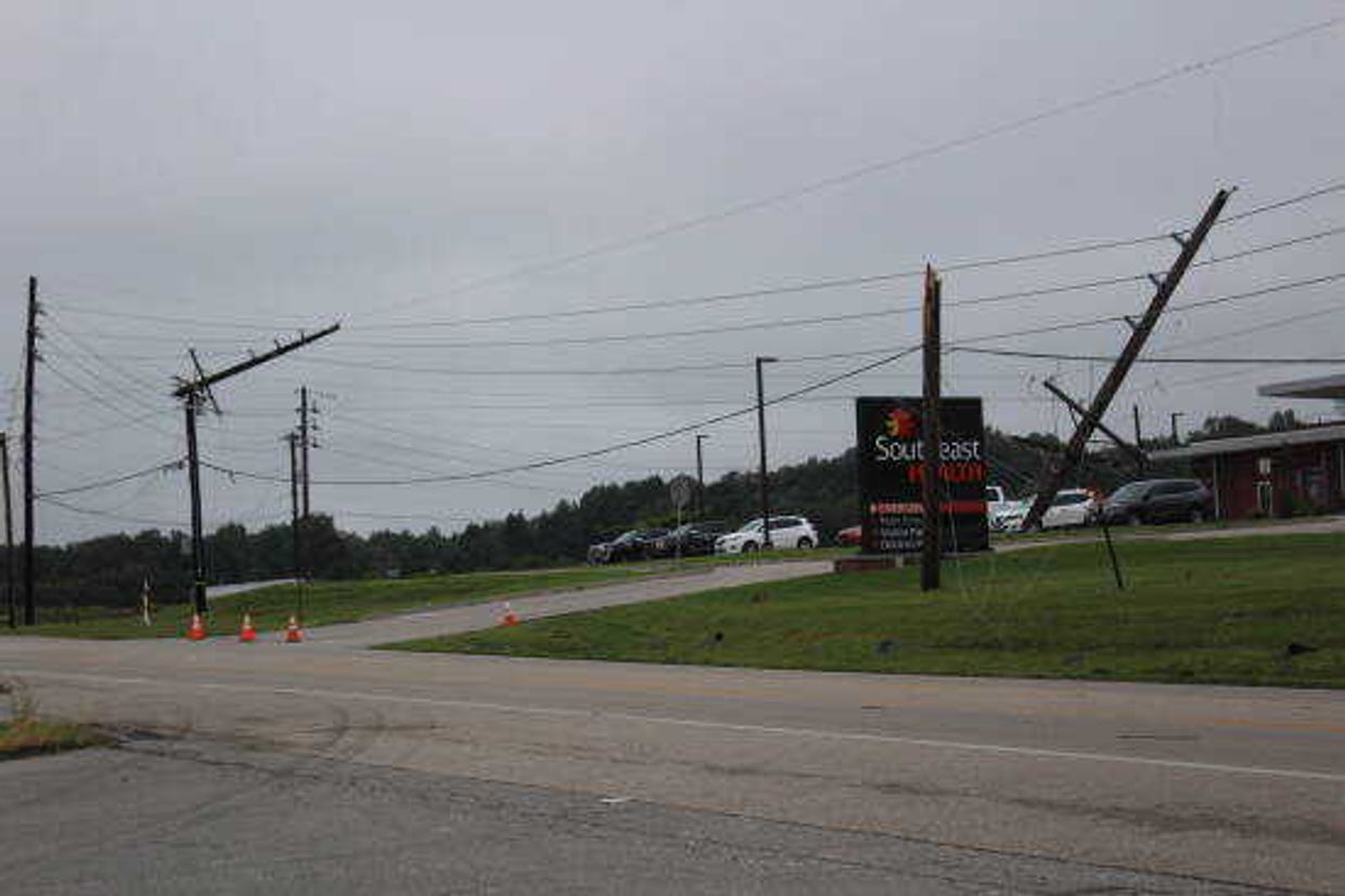 Electric poles in front of the hospital.