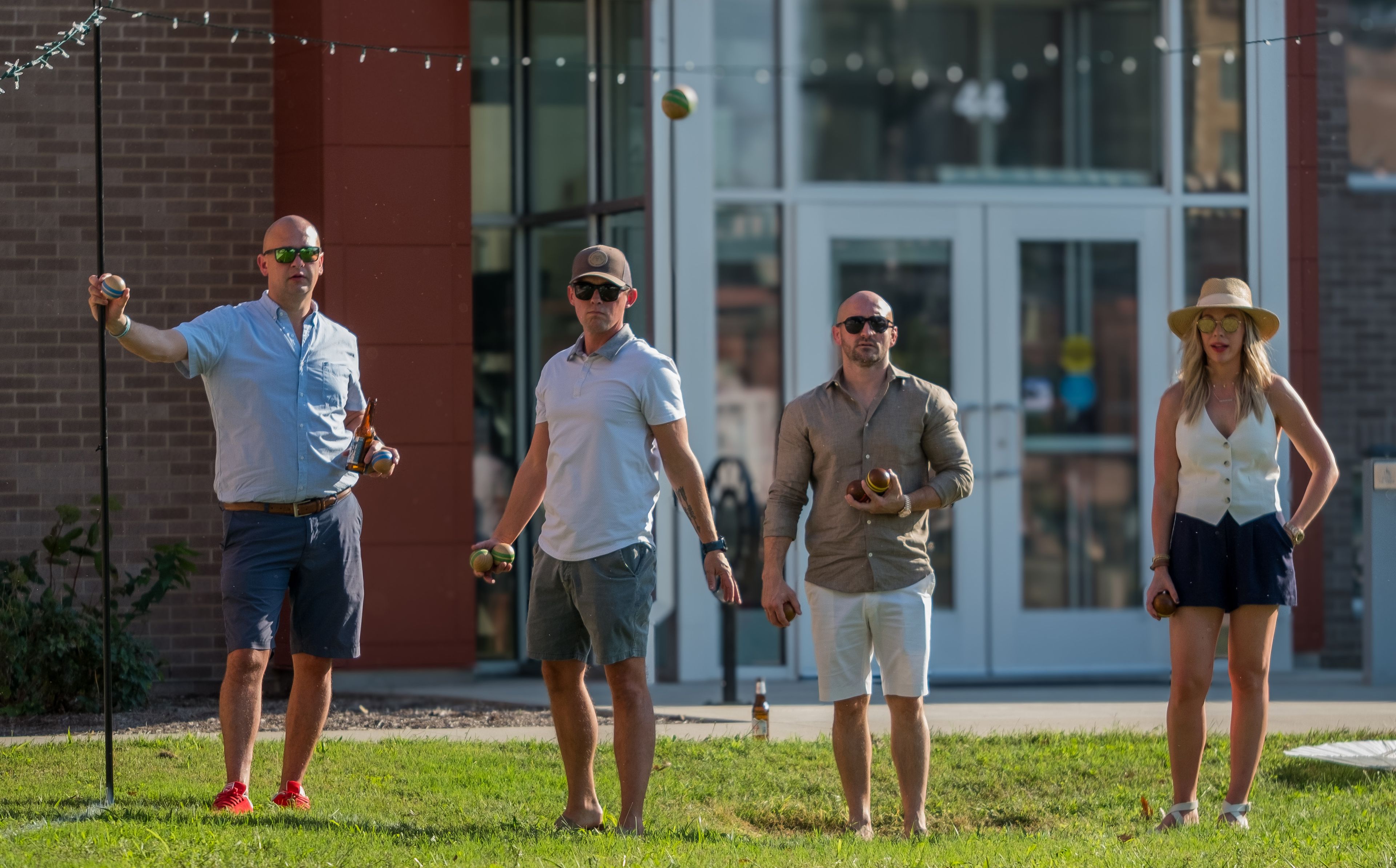 Attendees have fun participating in and watching Pétanque matches throughout the day.