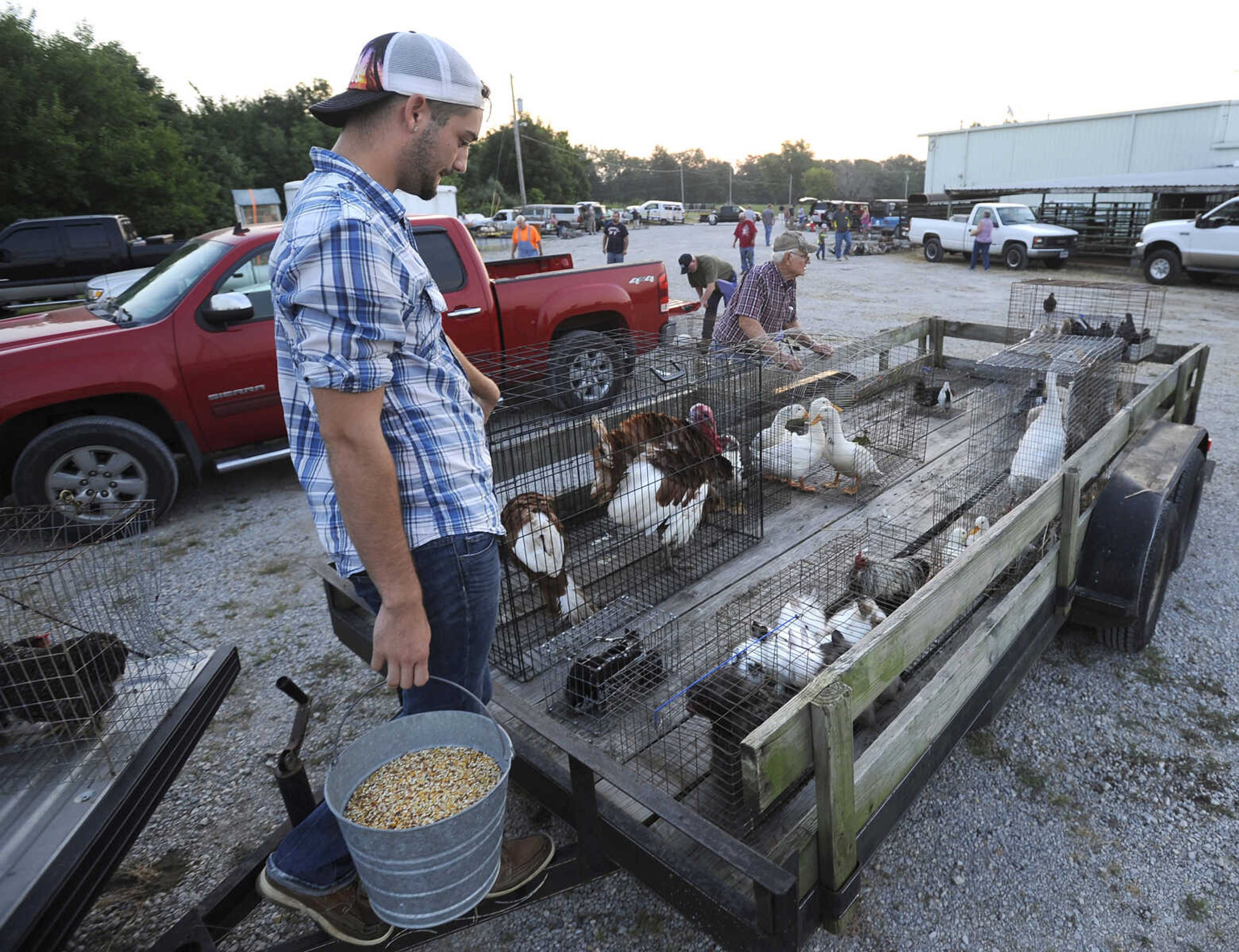 FRED LYNCH ~ flynch@semissourian.com
Joshua Price of Perryville, Missouri gets breakfast ready for his wares Saturday, July 14, 2018 at the Fruitland Swap Meet in Fruitland.