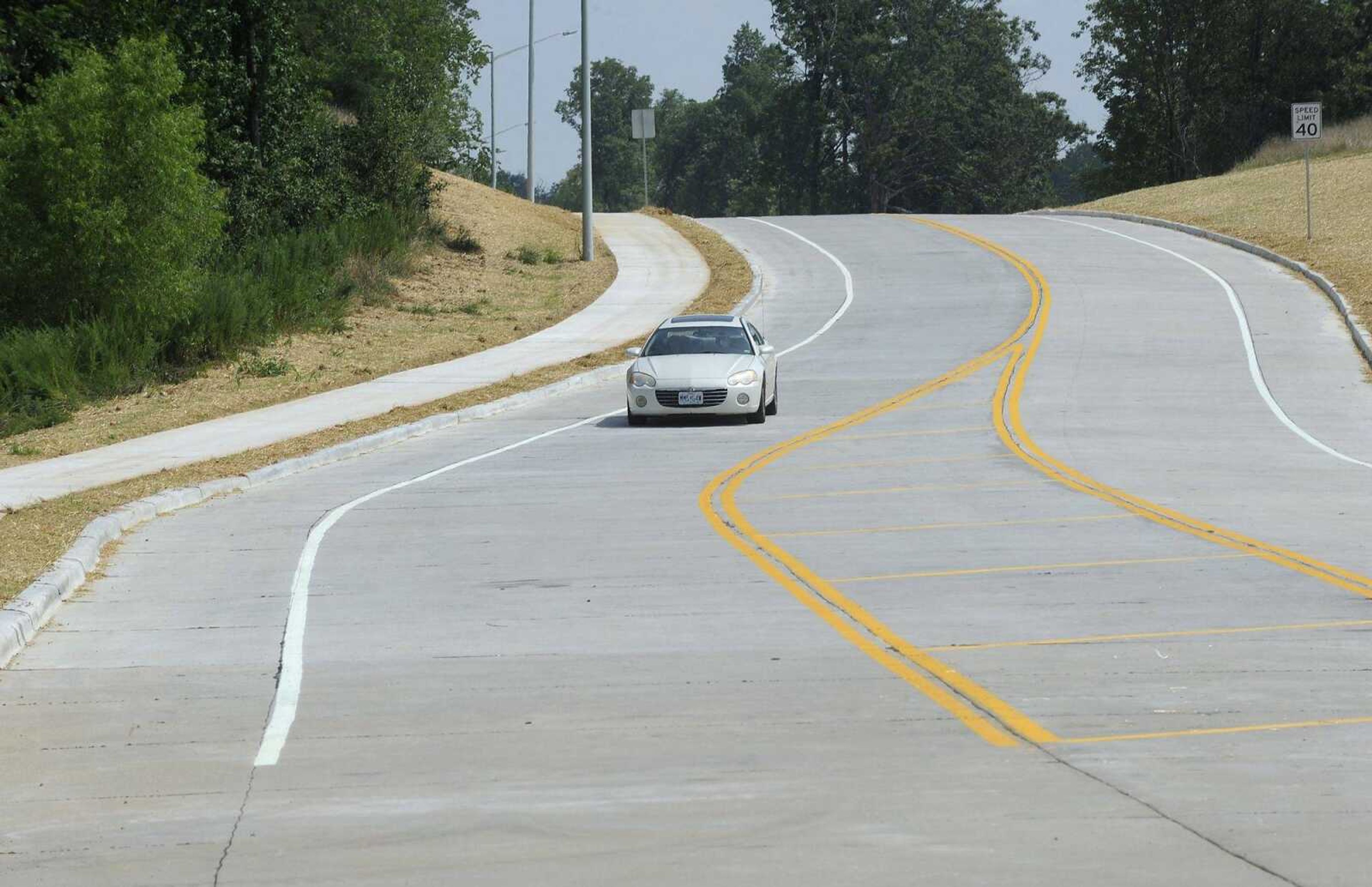 A motorist approaches the Scenic Drive intersection Thursday on the new section of Veterans Memorial Drive in Cape Girardeau.