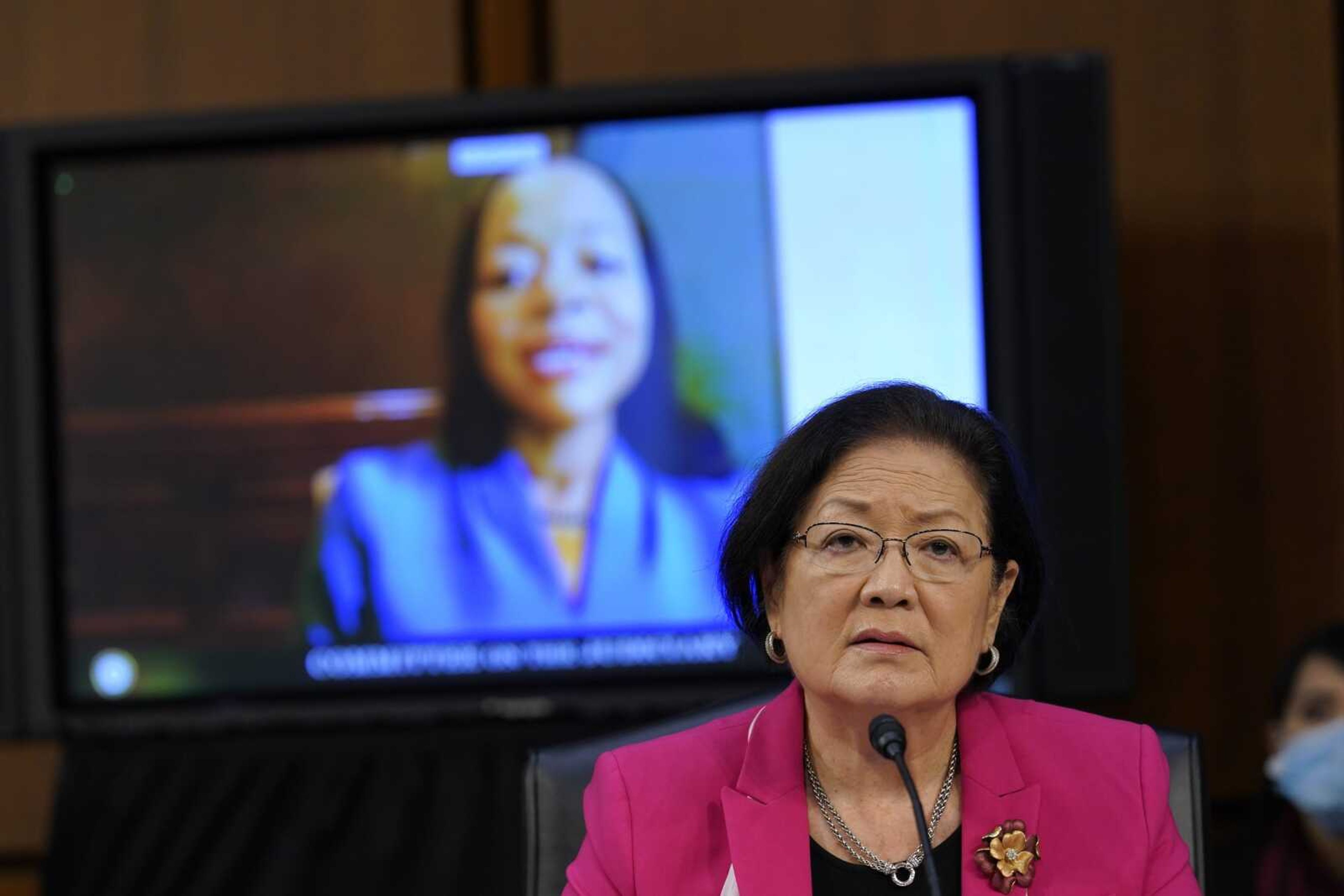 Kristen Clarke testifies Thursday during the confirmation hearing of Supreme Court nominee Amy Coney Barrett before the Senate Judiciary Committee as Sen. Mazie Hirono, D-Hawaii, listens on Capitol Hill in Washington.