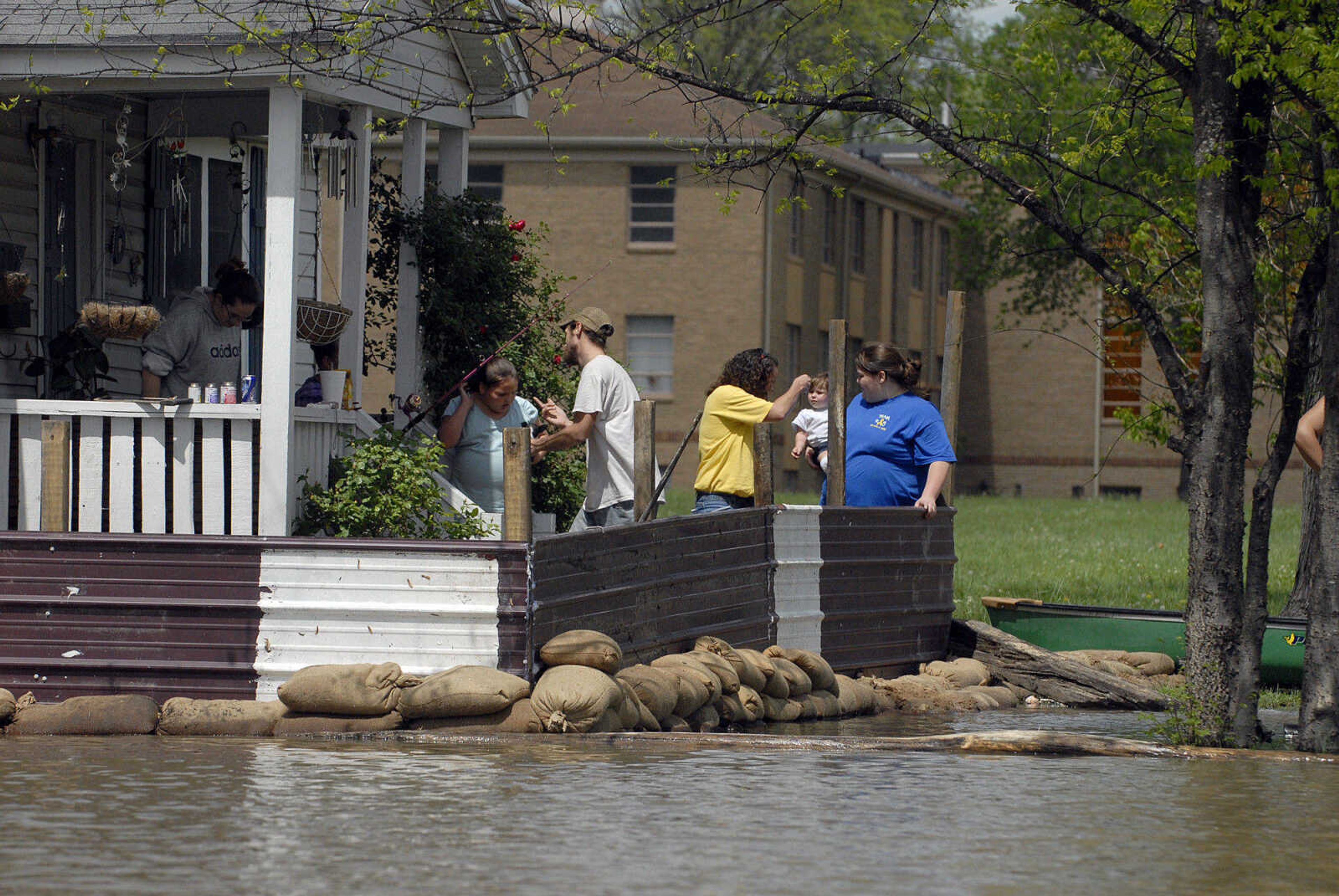 LAURA SIMON~lsimon@semissourian.com
Floodwater from the Mississippi River threatens a home on Main Street Thursday, April 28, 2011 in Cape Girardeau.