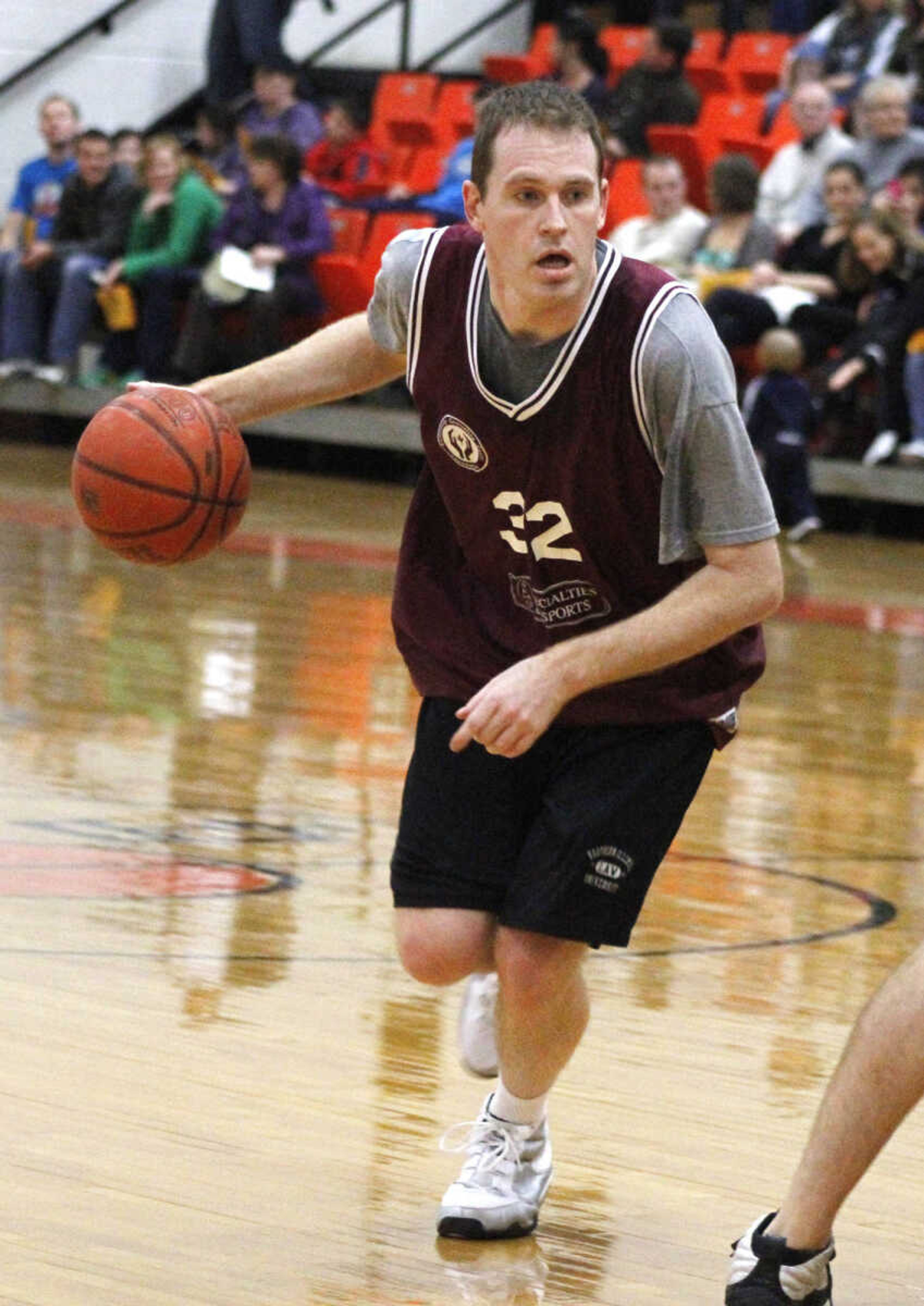 JONATHAN BRIDGES ~ photos@semissourian.com
The Lawyers' Brady Barke drives the ball against the Doctors Saturday, March 3, 3012 during the 19th annual Doctors vs. Lawyers basketball showdown at Cape Central Junior High School in Cape Girardeau. Doctors won 84-70.