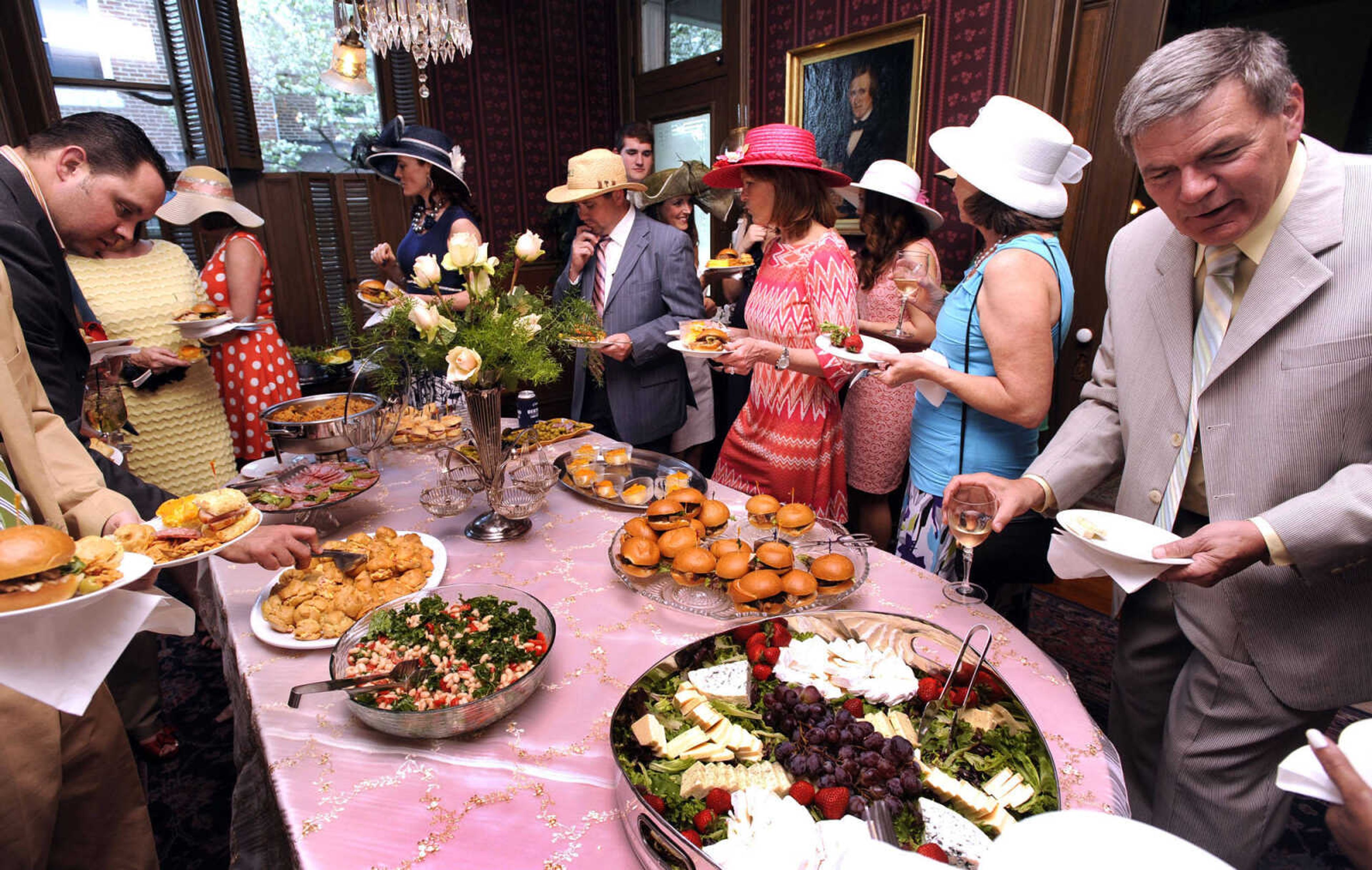 Heavy hors d'oeuvres are served to guests after the Kentucky Derby race on Saturday, May 3, 2014 at the Glenn House in Cape Girardeau.