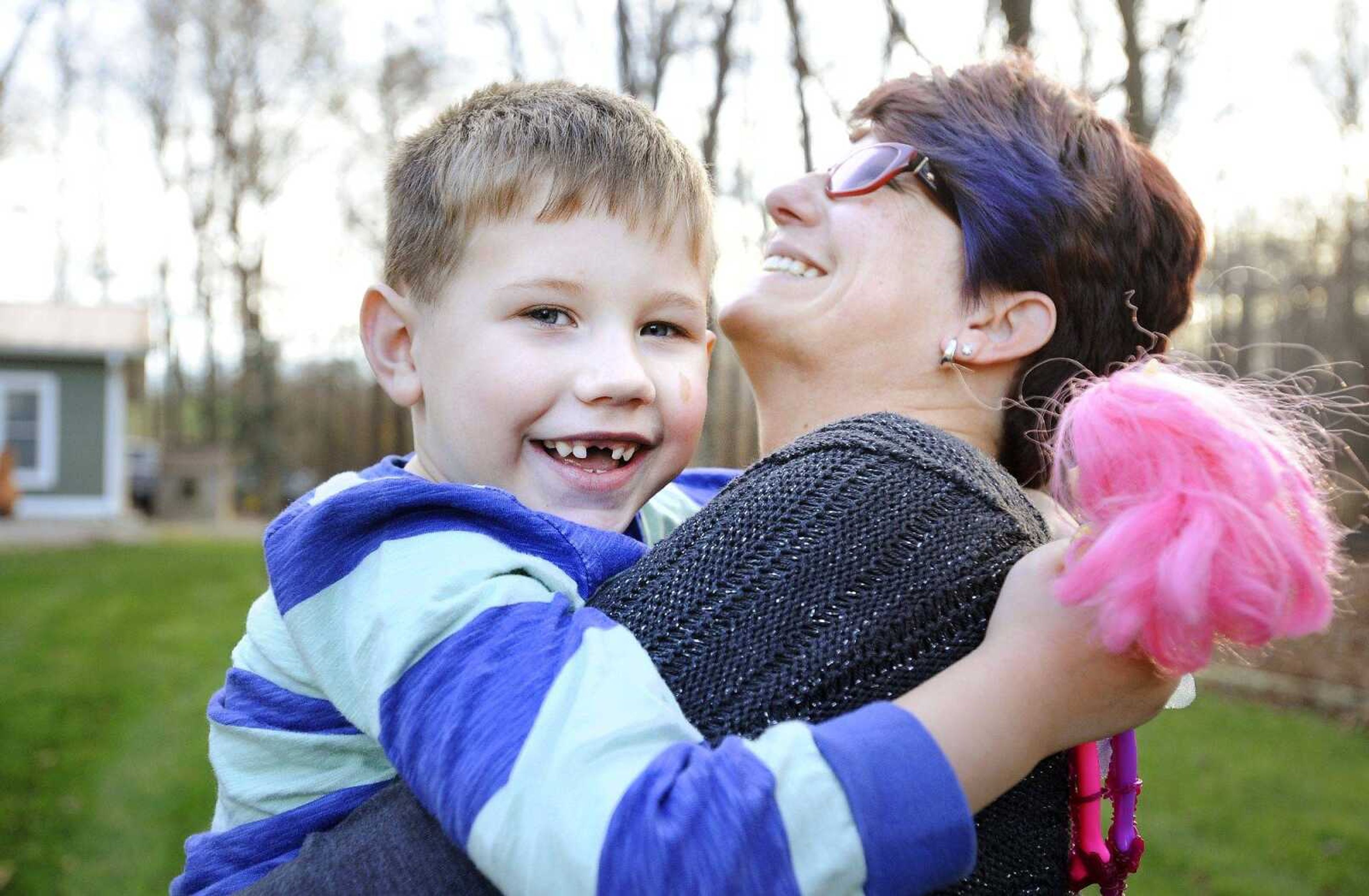 Declan Stevens hugs his mother, Vanessa, at their Cape Girardeau County home, Tuesday, Nov. 24, 2015. (Laura Simon)