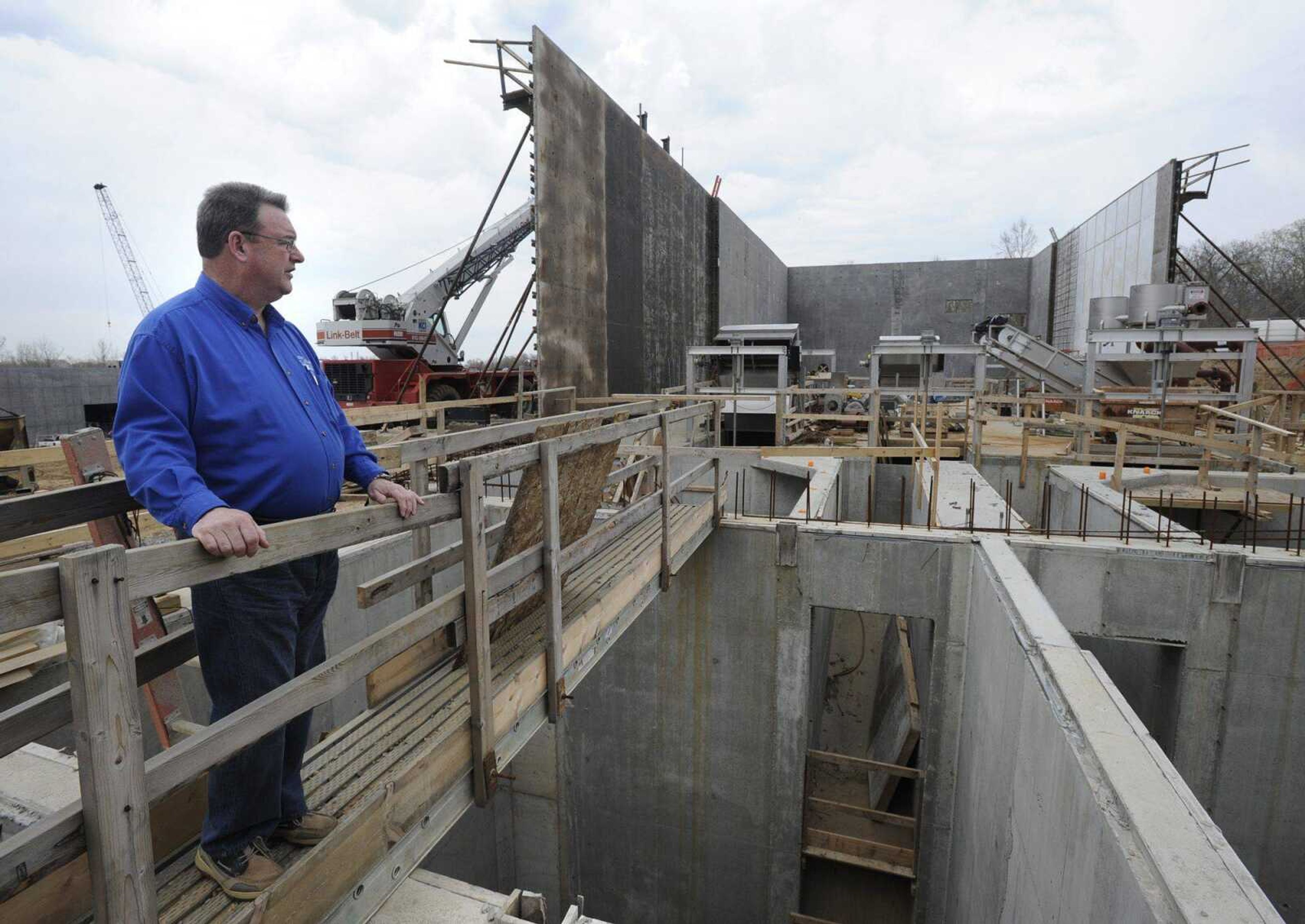 Tim Gramling shows the headworks building under construction at the new wastewater treatment plant on Friday in Cape Girardeau. (Fred Lynch)