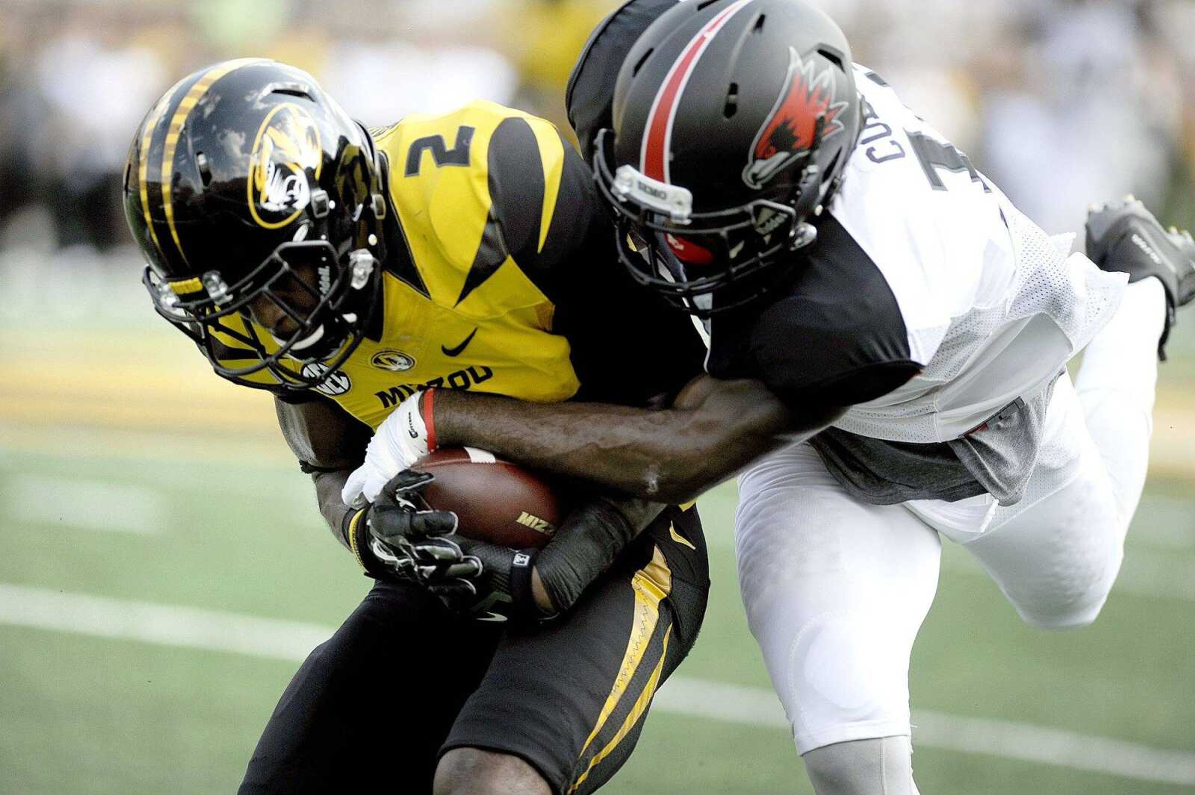 Southeast Missouri State's David Coley tackles Mizzou's Nate Brown in the first quarter, Saturday, Sept. 5, 2015, at Faurot Field in Columbia, Missouri. Mizzou defeated Southeast 34-3. (Laura Simon)