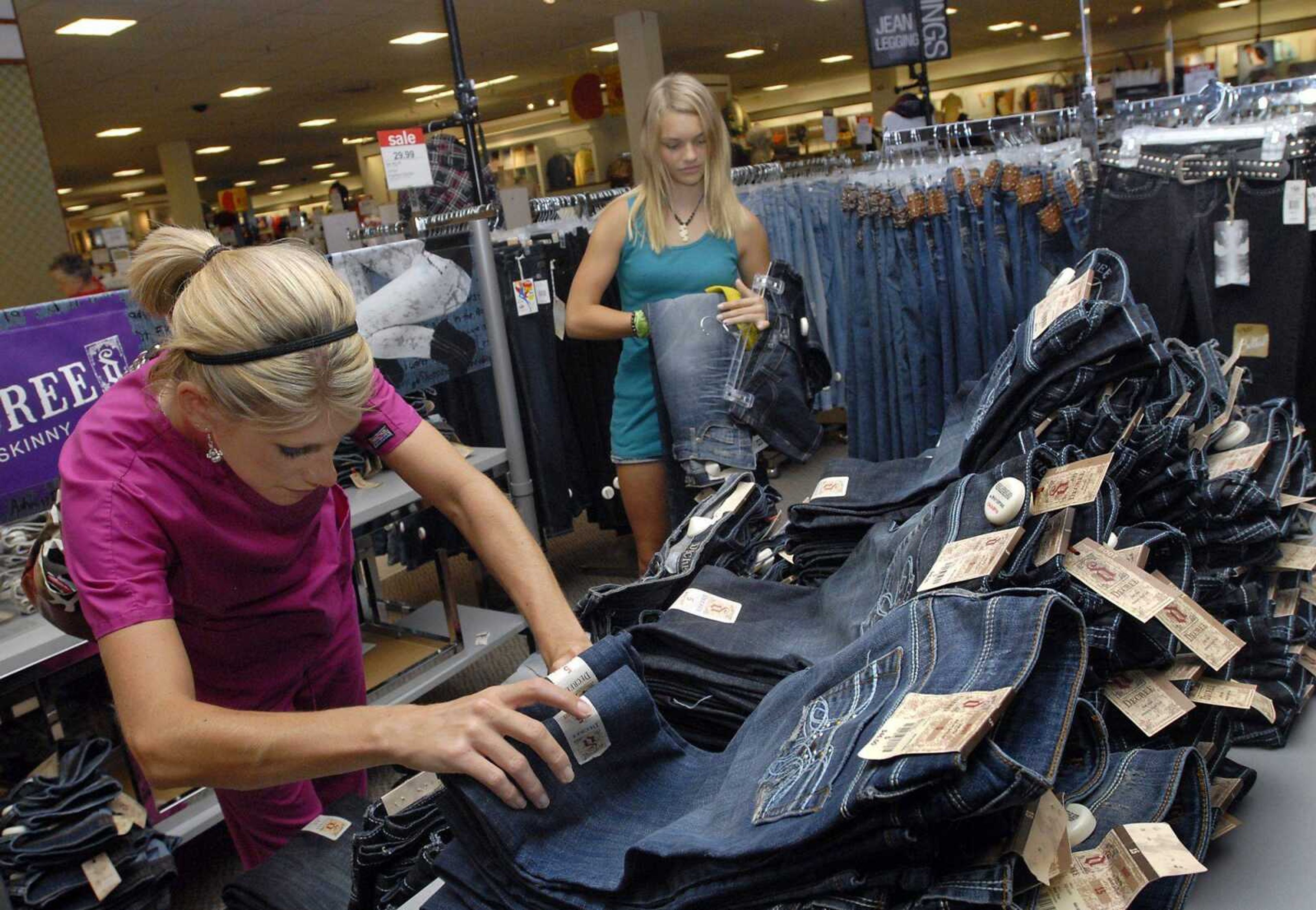 Kelsie Meystedt, 13, right, does some back-to-school shopping with her mother Amanda Meystedt at J.C. Penney in Cape Girardeau on Wednesday. (Kristin Eberts)