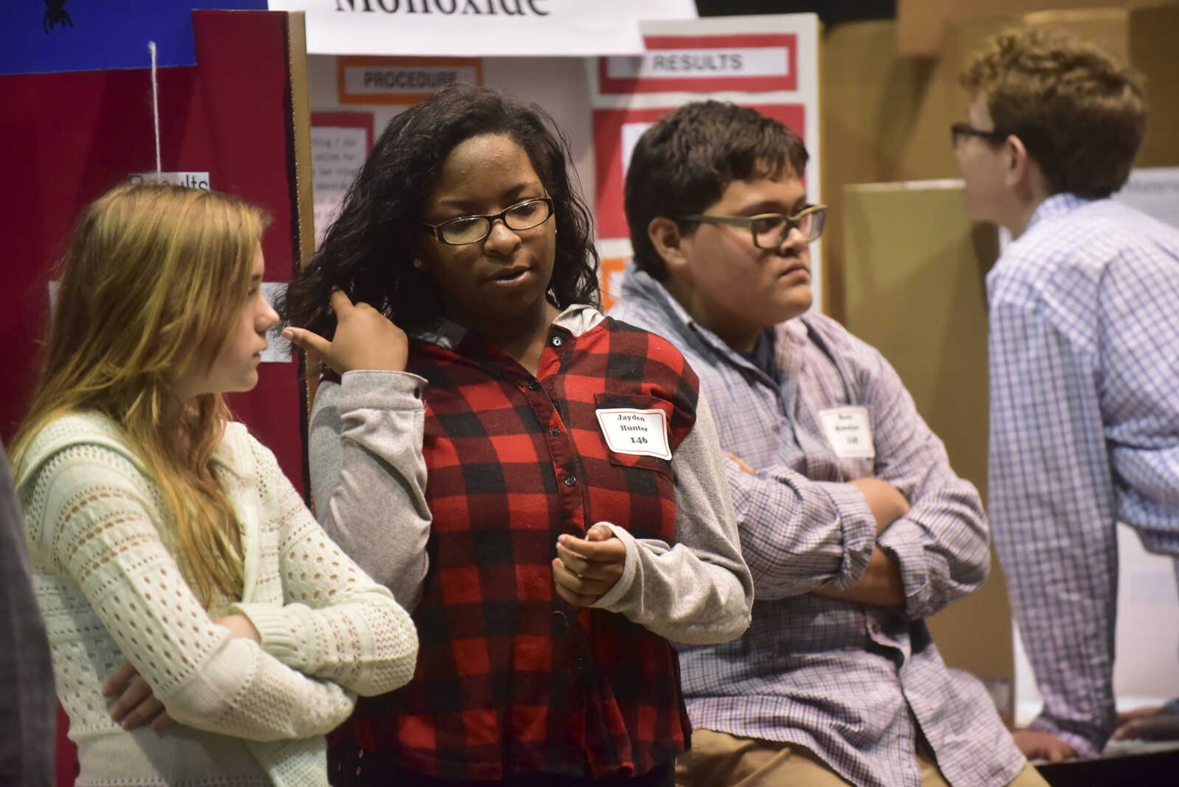 Students wait to be judged during the Southeast Missouri Regional Science Fair Tuesday, March 7, 2017 at the Show Me Center in Cape Girardeau.