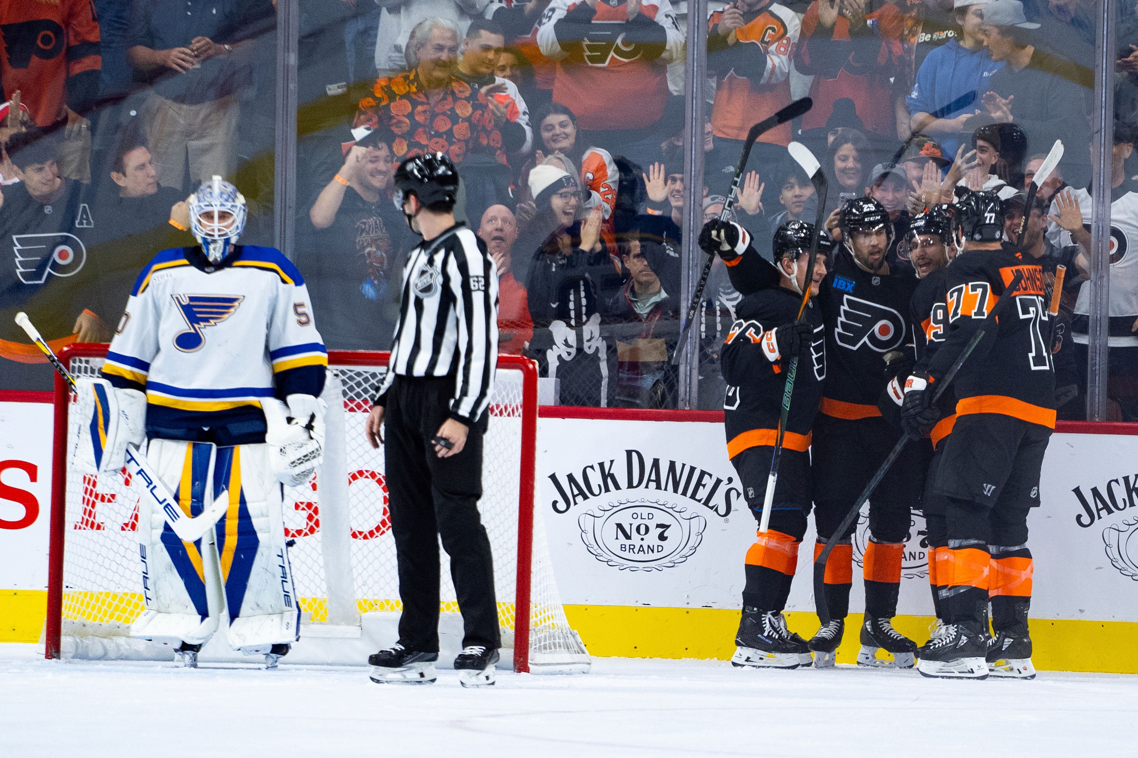 Philadelphia Flyers' Garnet Hathaway, second from right, celebrates his goal with teammates against St Louis Blues' Jordan Binnington, left, during the first period of an NHL hockey game, Thursday, Oct. 31, 2024, in Philadelphia. (AP Photo/Chris Szagola)