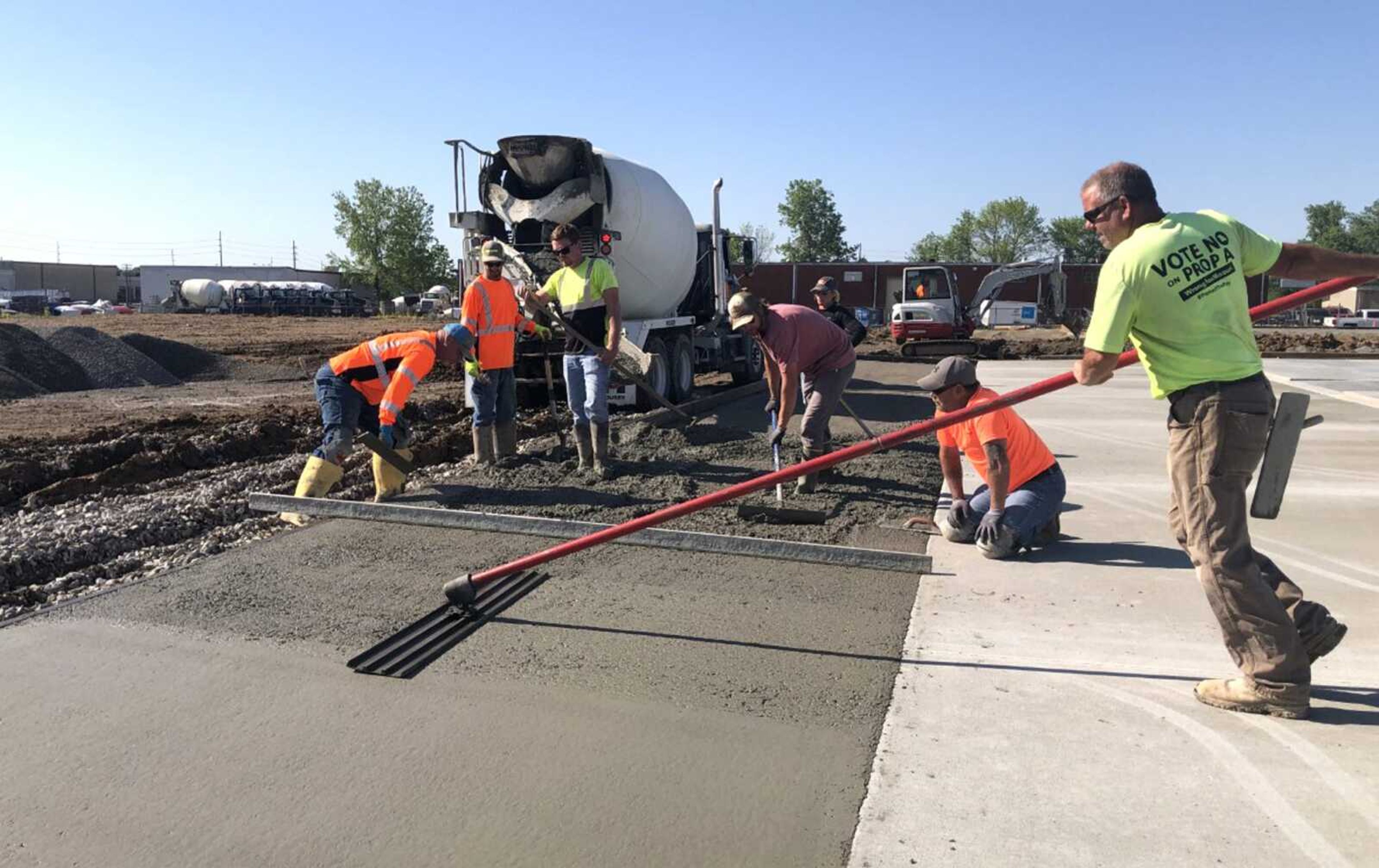 A crew from Fronabarger Concreters Inc. pours the foundation for new storage units along Broadview Street on Friday in Cape Girardeau. The project was one of several discussed last week during the Cape Girardeau Area Chamber of Commerce's First Friday Coffee program.