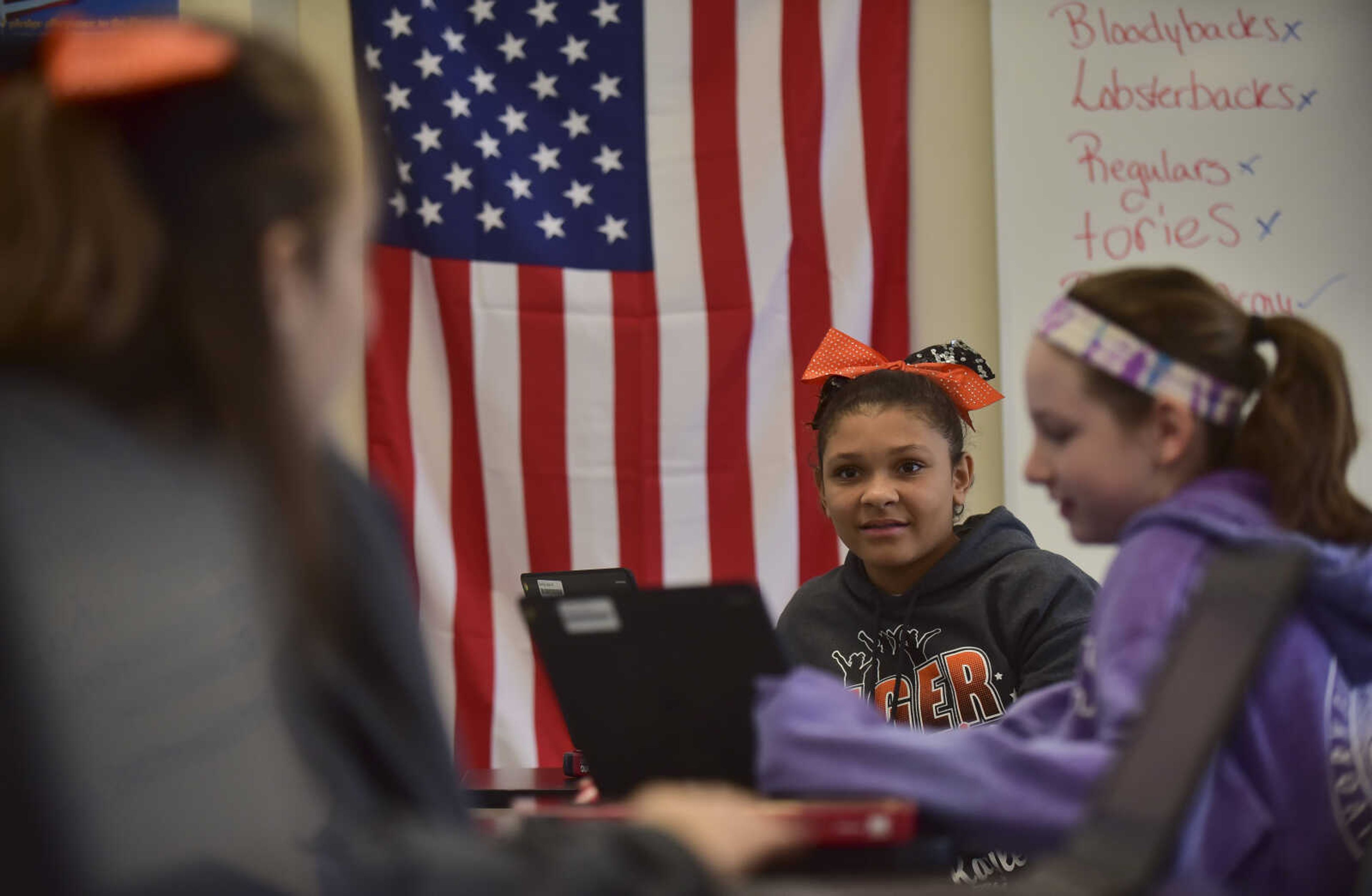 ANDREW J. WHITAKER ~ awhitaker@semissourian.com
From left, Alex Seabaugh, Kaylie Sterling and Mollie Davidson vote on their laptops during a mock election Tuesday, Nov. 8, 2016 at Cape Central Junior High School in Cape Girardeau.