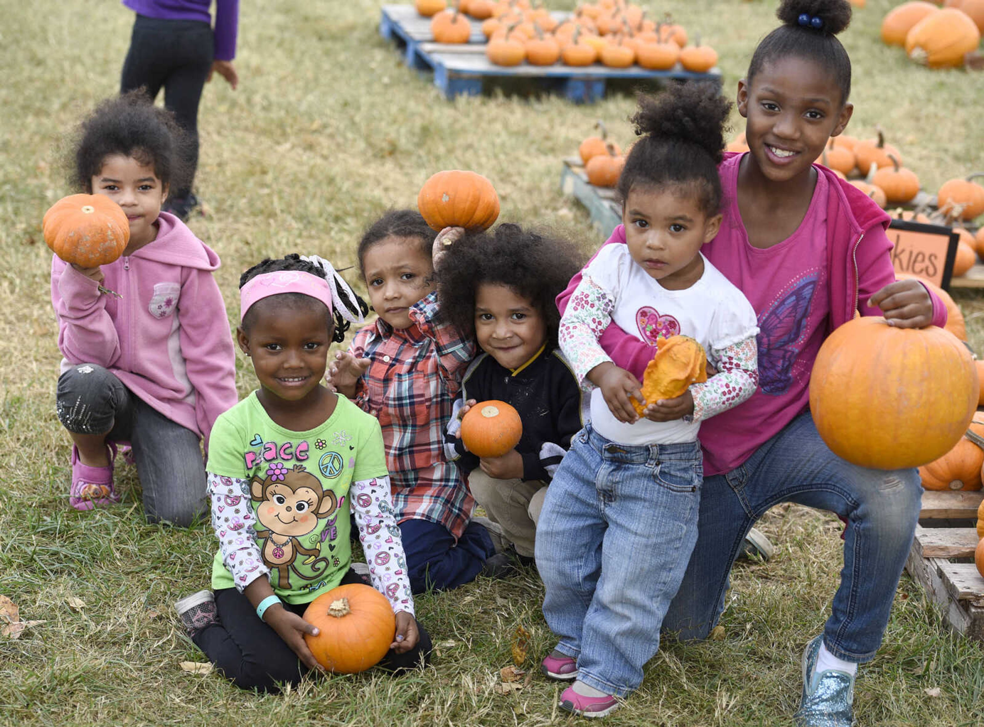 LAURA SIMON ~ lsimon@semissourian.com

From left to right, Maleah Espinoza, Dashlay Gilbert, Manuel Espinoza, Trenton Espinoza, Za'Kayla Espinoza and Tia Gilbert pose for a photo with their pumpkins at the Grace United Methodist Church pumpkin patch on Wednesday, Oct. 12, 2016 in Cape Girardeau.