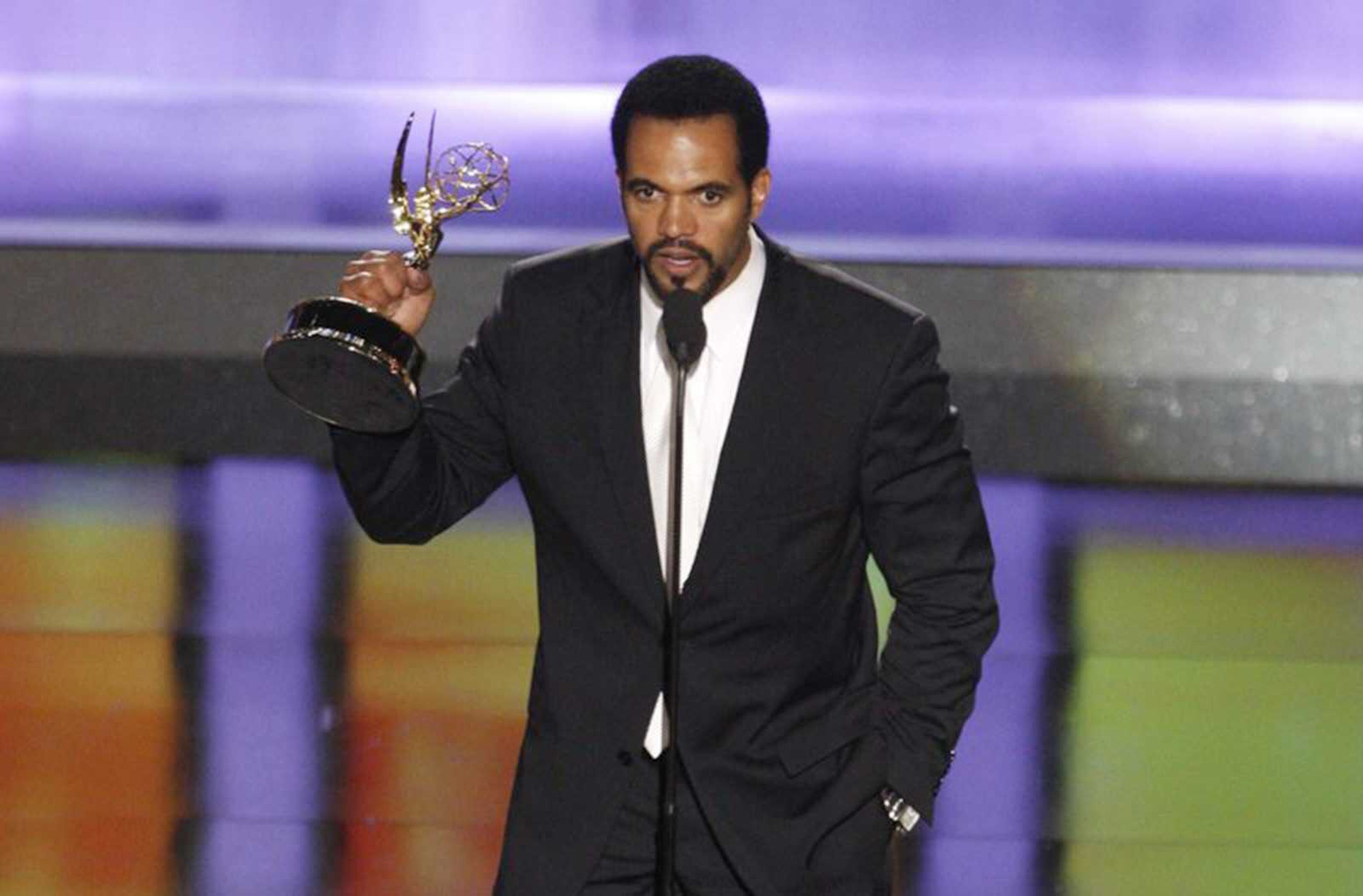 Kristoff St. John accepts the award for outstanding supporting actor in a drama series for his work on "The Young and the Restless" at the 35th annual Daytime Emmy Awards in Los Angeles in 2008.