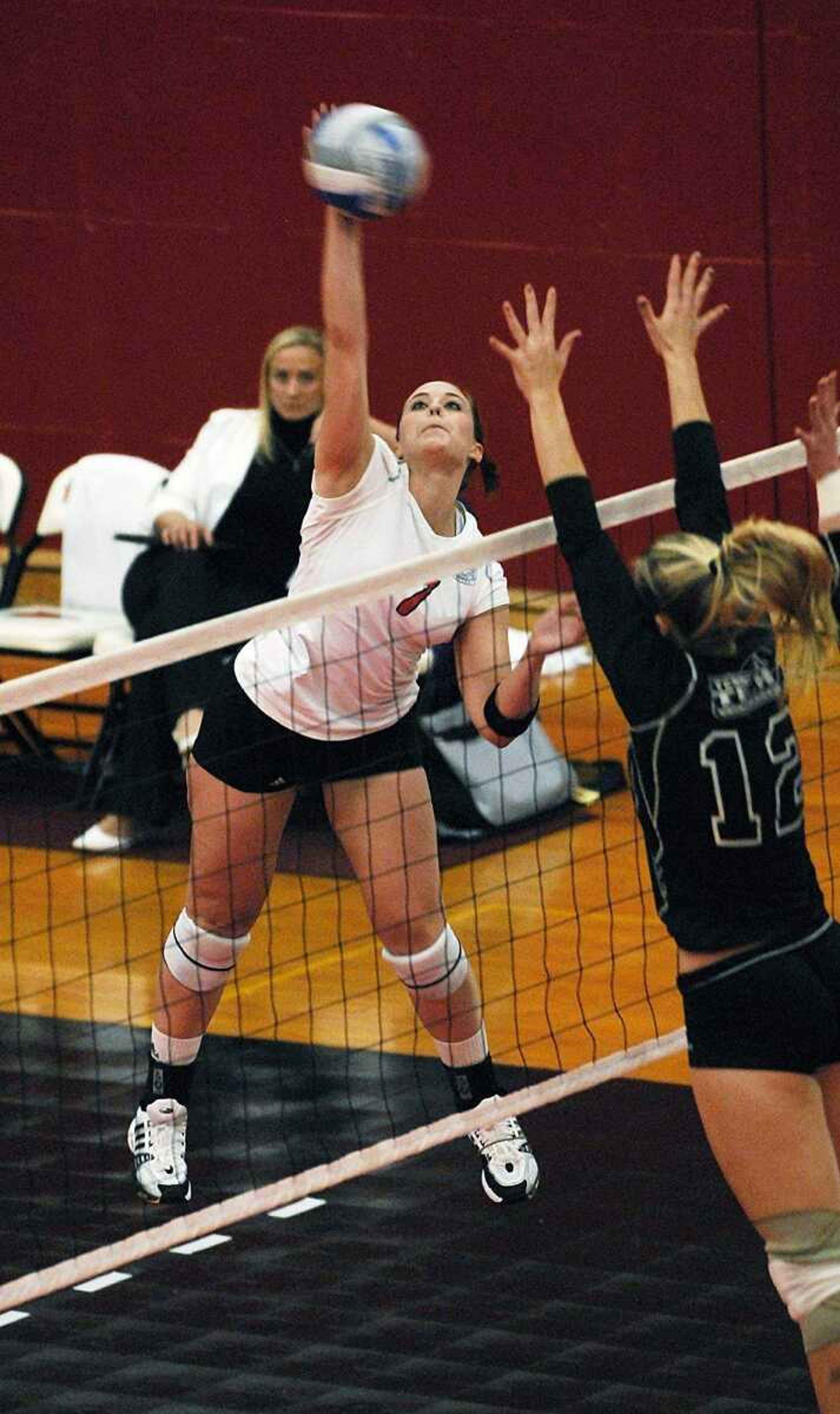 CHUCK WU ~ cwu@semissourian.com
Aubrey Dondlinger spikes the ball high up in the air.