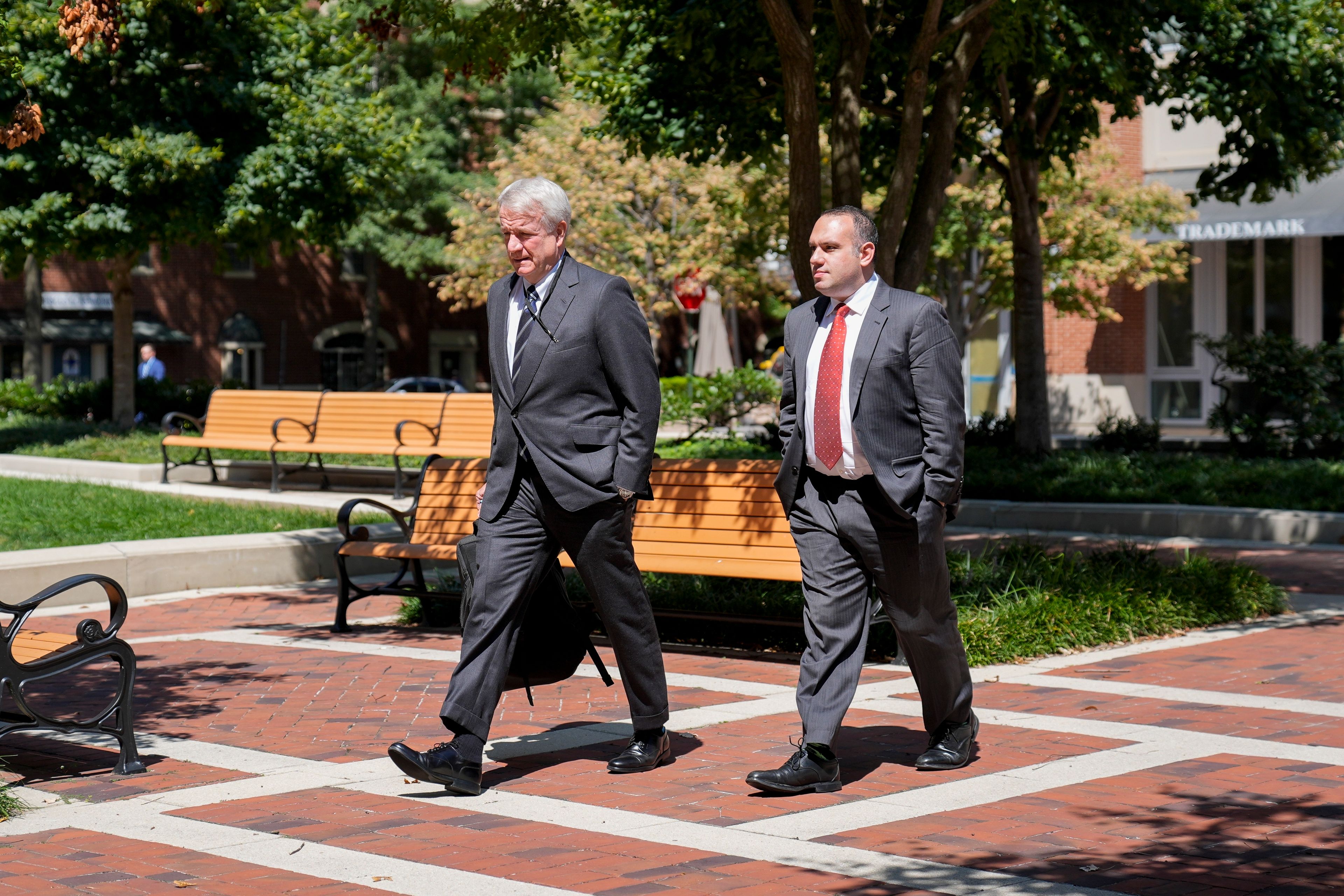 Eric Mahr, left, a lawyer representing Google in the Department of Justice's antitrust case against the tech giant, returns to the U.S. District Court for the Eastern District of Virginia after a lunch break in the trial, Monday, Sept. 9, 2024, in Alexandria, Va. (AP Photo/Stephanie Scarbrough)