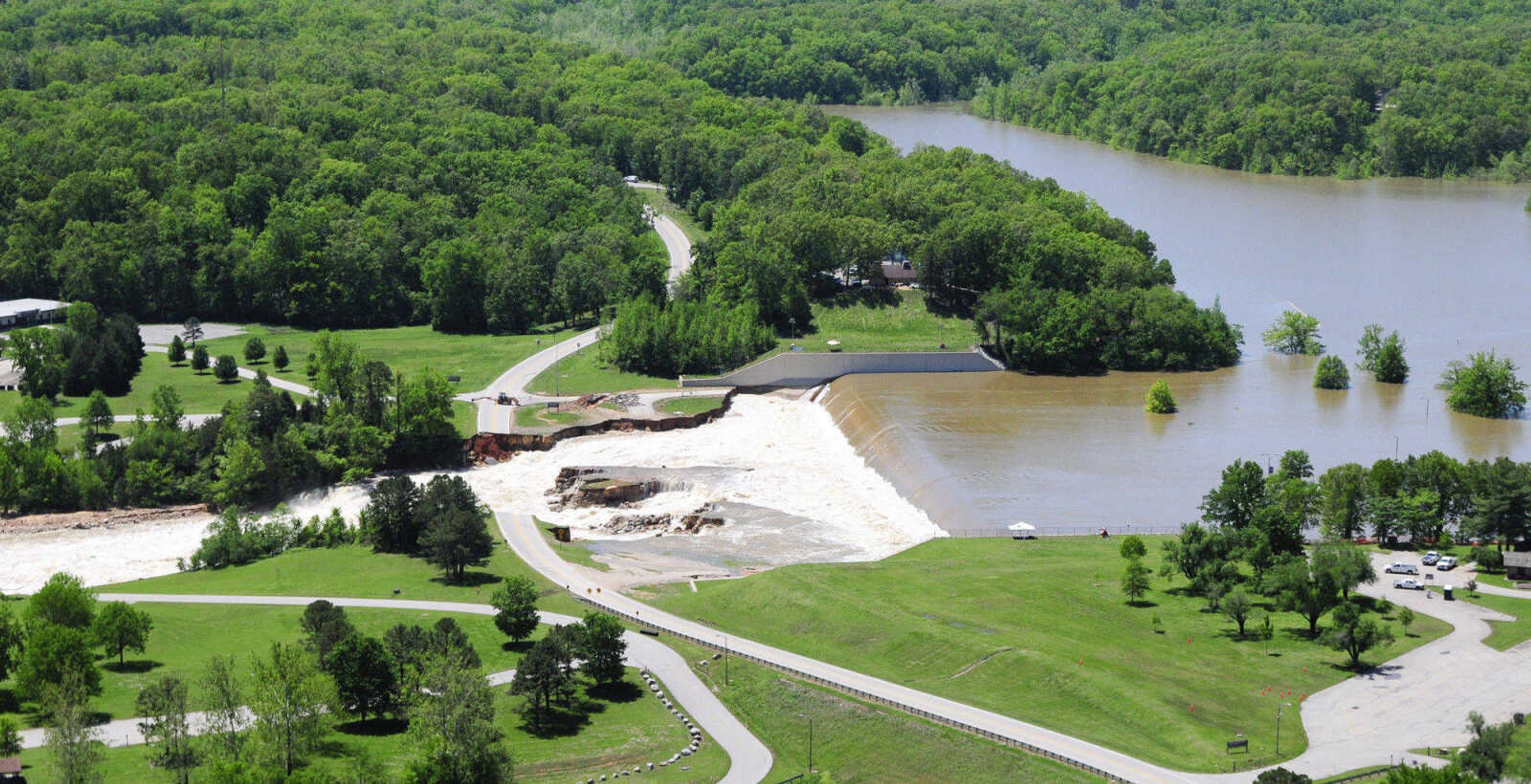 Wappapello Lake in Wayne County, Mo., flows over its emergency spillway and into the already swollen St. Francis River Tuesday, May 3, 2011. U.S. Army Corps of Engineers officials say the spillway is operating as designed. (AP Photo/Daily American Republic, Paul Davis)