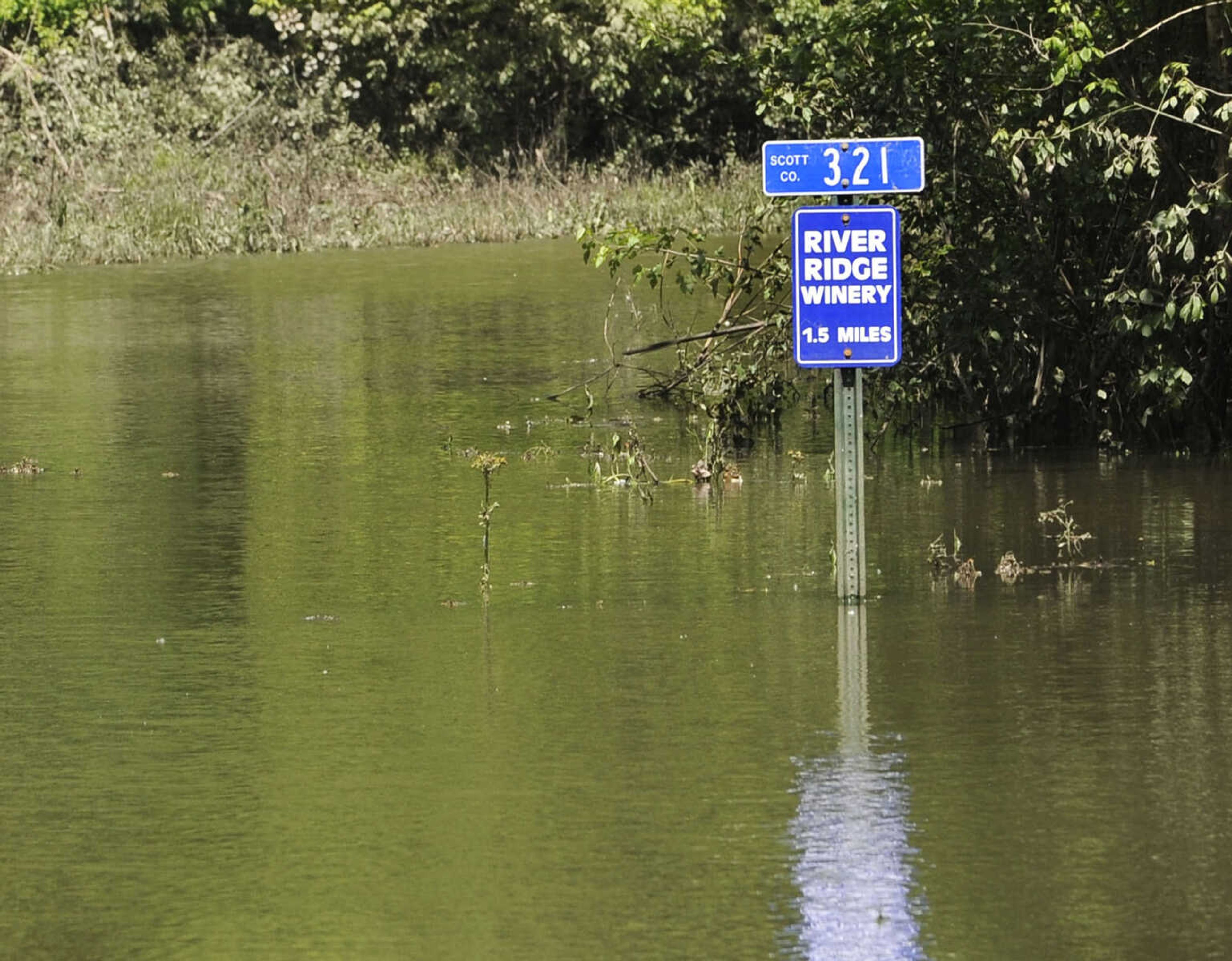 FRED LYNCH ~ flynch@semissourian.com
Water still covers Scott County Road 321, Water Street, Sunday, May 8, 2011 in Commerce, Mo.