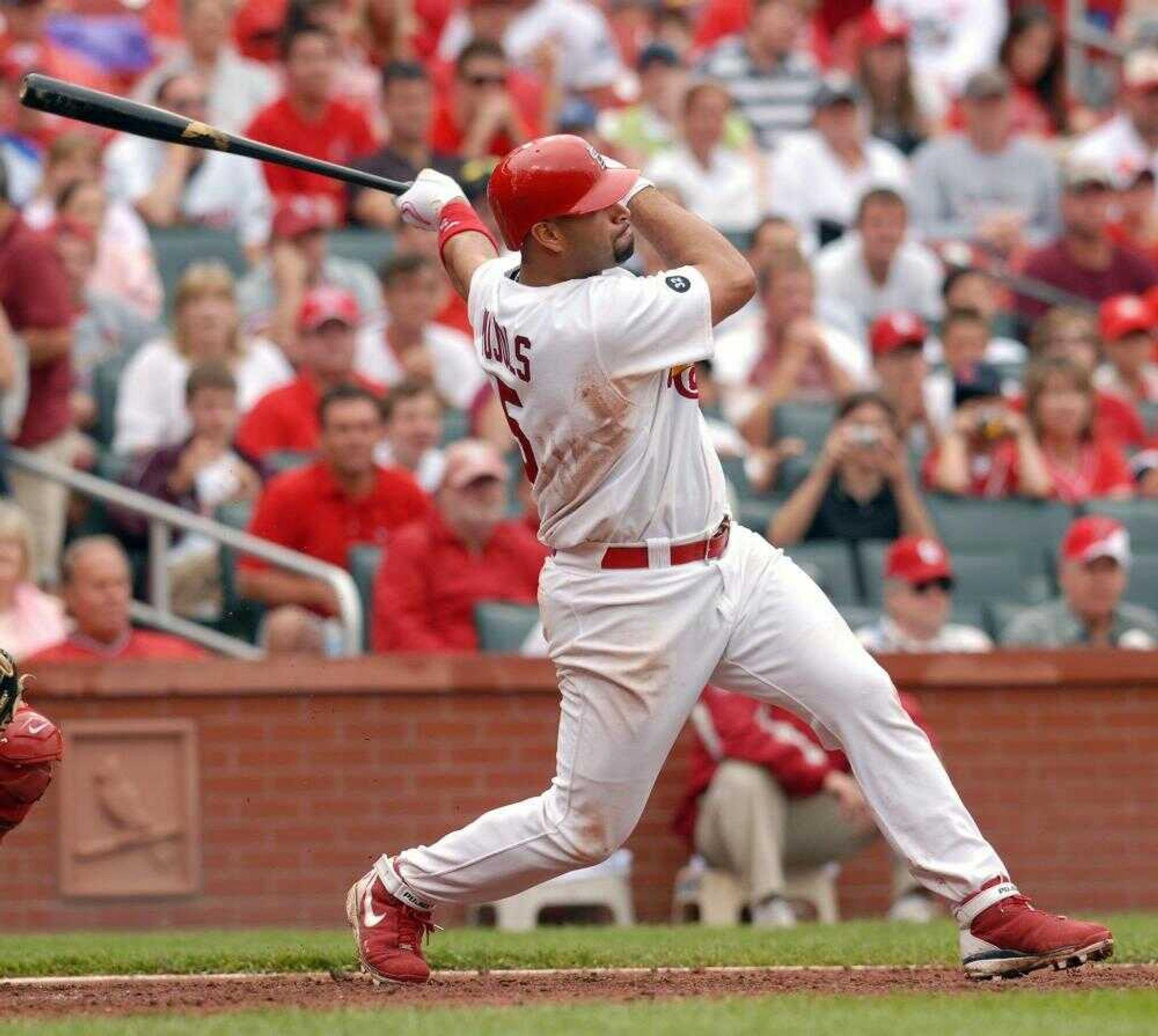 Cardinals slugger Albert Pujols watched his fifth-inning, three-run home run against the Los Angeles Angels during Sunday's game in St. Louis. (Bill Boyce ~ Associated Press)