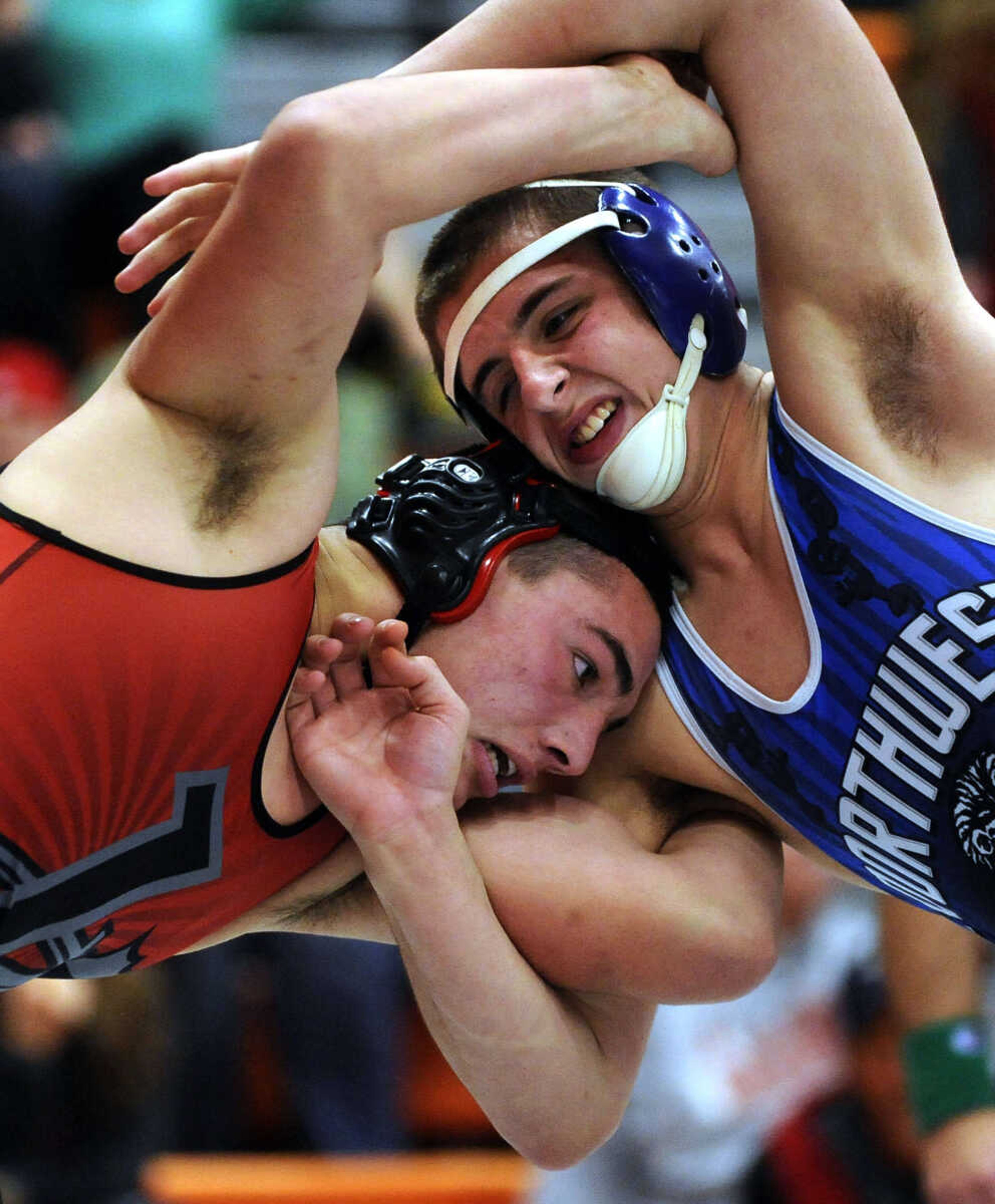 FRED LYNCH ~ flynch@semissourian.com
Jackson's Chris Collier tries to gain the advantage over Northwest's Jacob Bender during their 195-pound championship match at the Tiger Classic on Saturday, Dec. 21, 2013 at Central High School. Collier won the match.