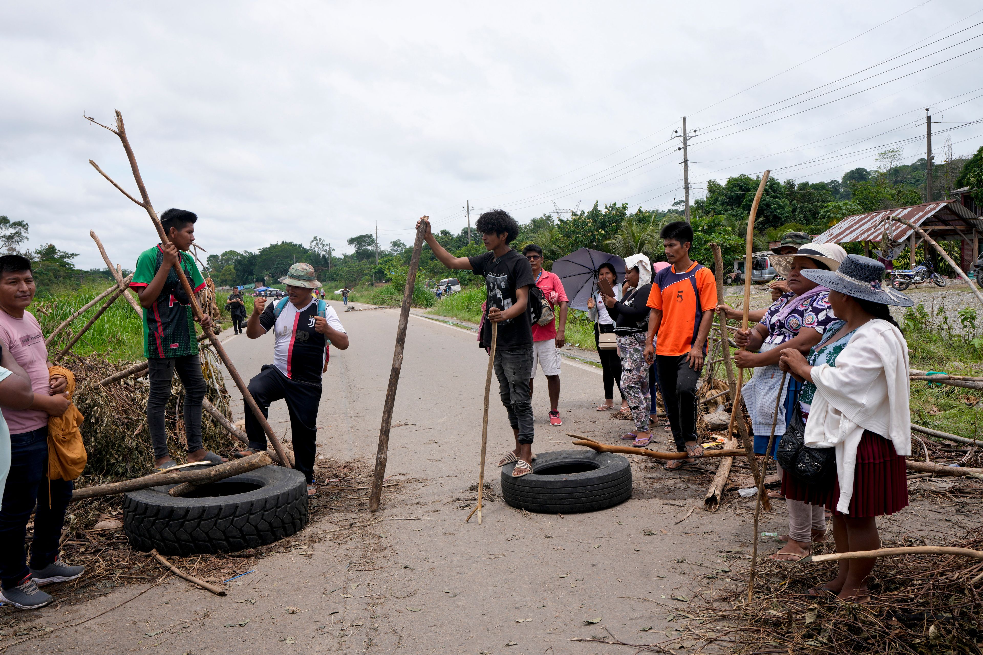 Followers of former President Evo Morales block a road at the Chapare region, Bolivia, Sunday, Nov. 3, 2024, amid an ongoing political conflict with the government of President Luis Arce. (AP Photo/Juan Karita)