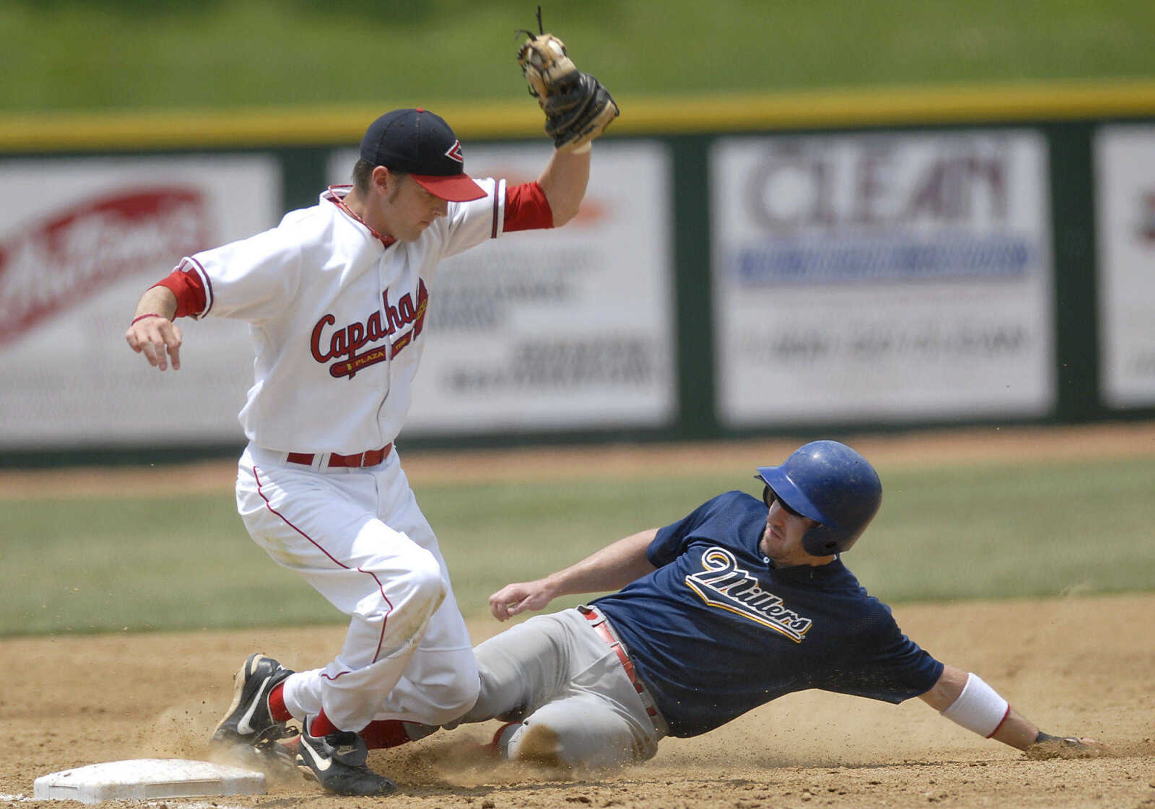 KIT DOYLE ~ kdoyle@semissourian.com
Shortstop Denver Stuckey fails to fully block third base while trying to tag out Waterloo's Chas Wigger Saturday, June 13, 2009, at Capaha Field.