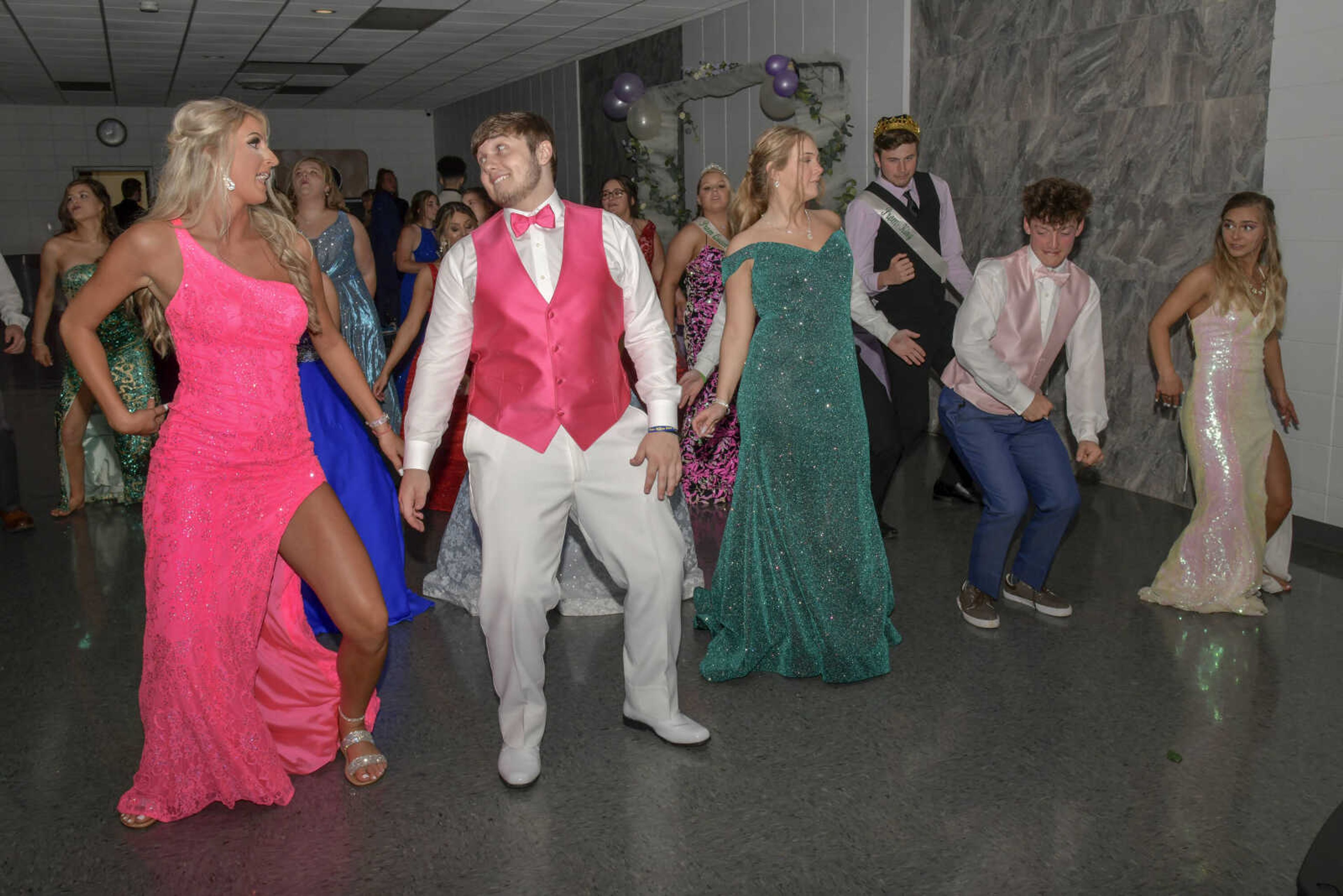 Jersey Black and Spencer Stratman, front left, dance during prom at the Front Porch in Scott City on Saturday, April 24, 2021.