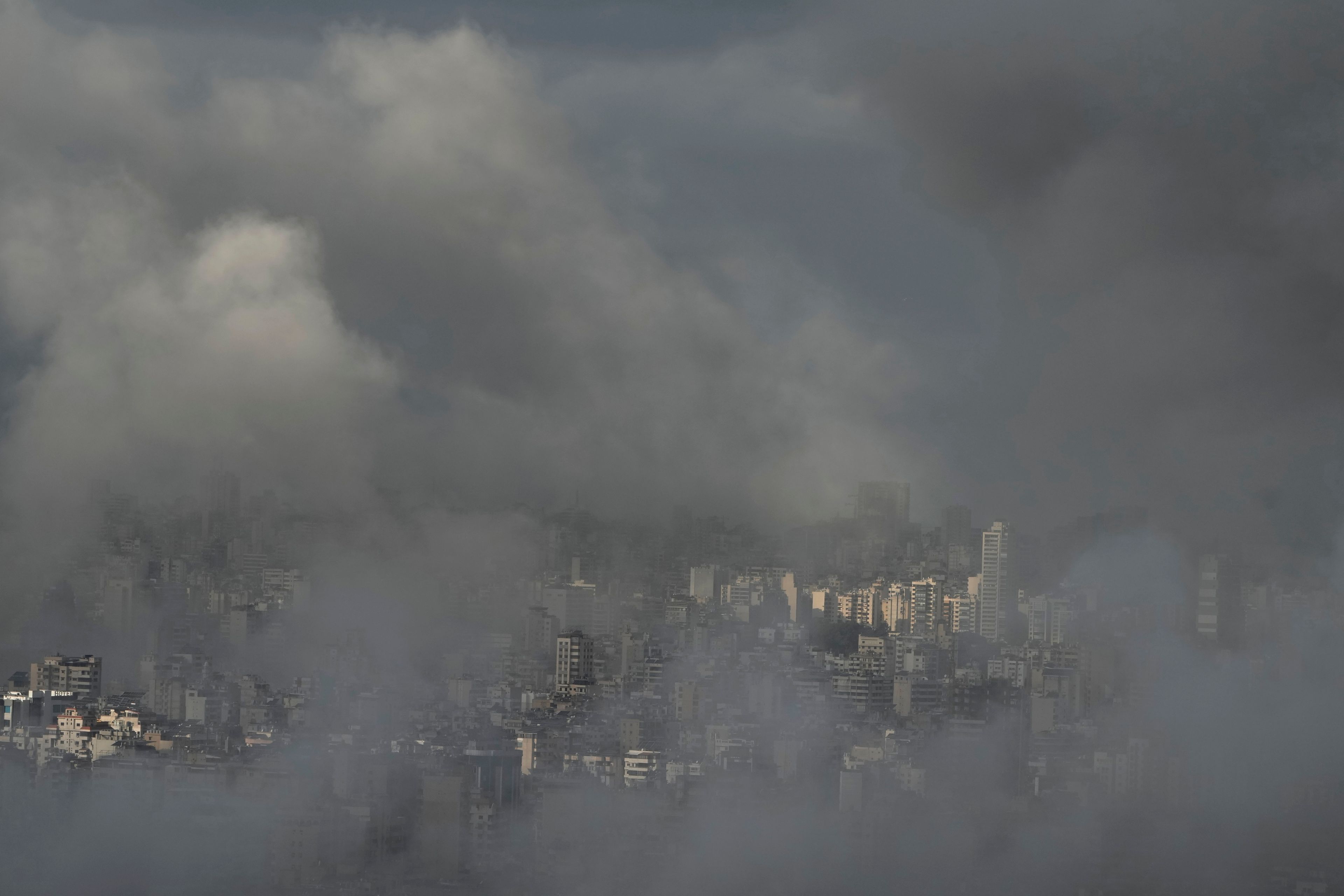 Smoke rises following an Israeli airstrike on Dahiyeh, in Beirut, Lebanon, Monday, Nov. 25, 2024. (AP Photo/Bilal Hussein)