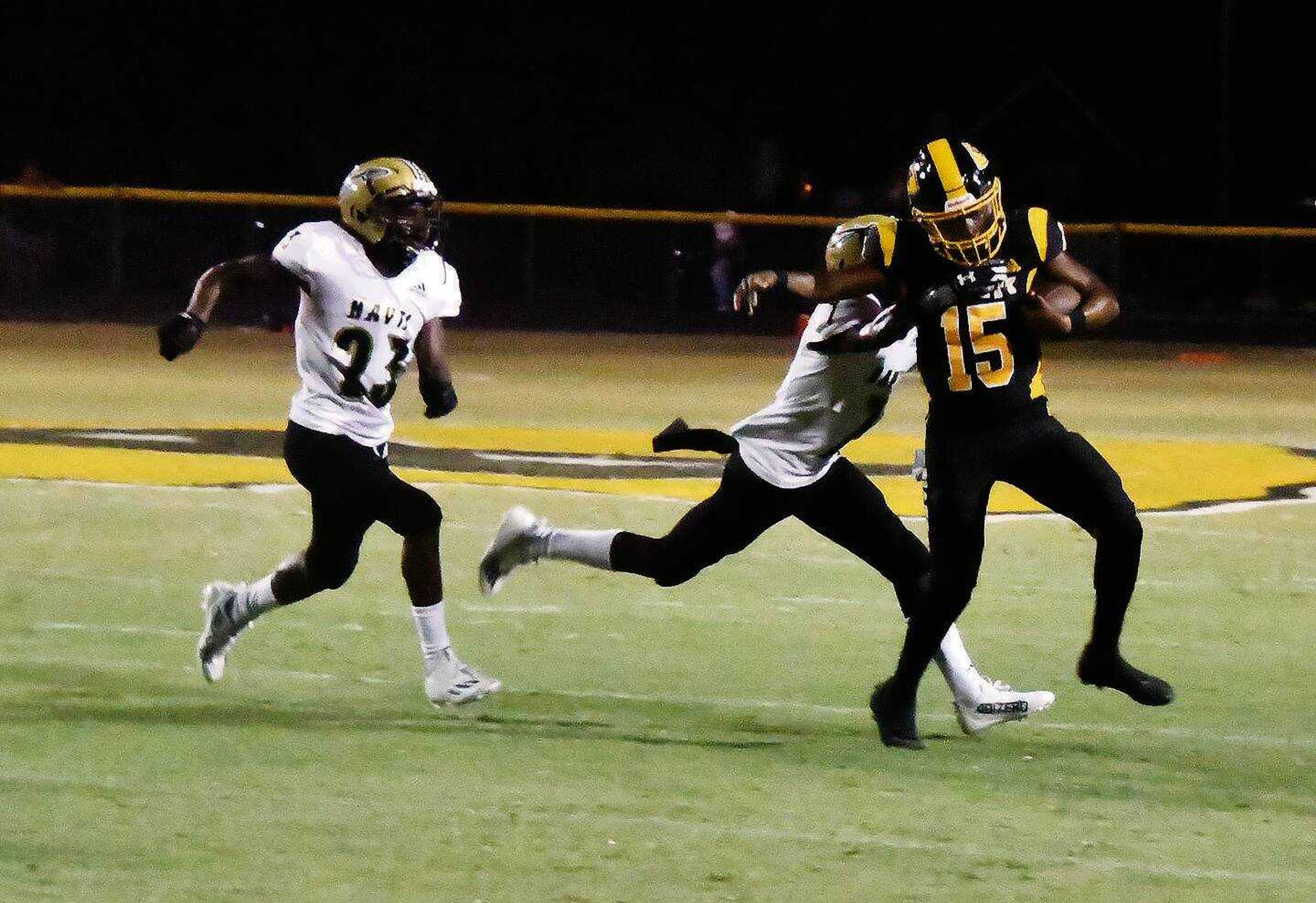 Kennett's Tyquavious Jones (15) has been the center of attention for opposing defenses this season, as noted in the season-opener versus Hayti on Friday, Aug. 25, at Metz Cherry Stadium. Jones continues to develop as the Indians� starting quarterback.