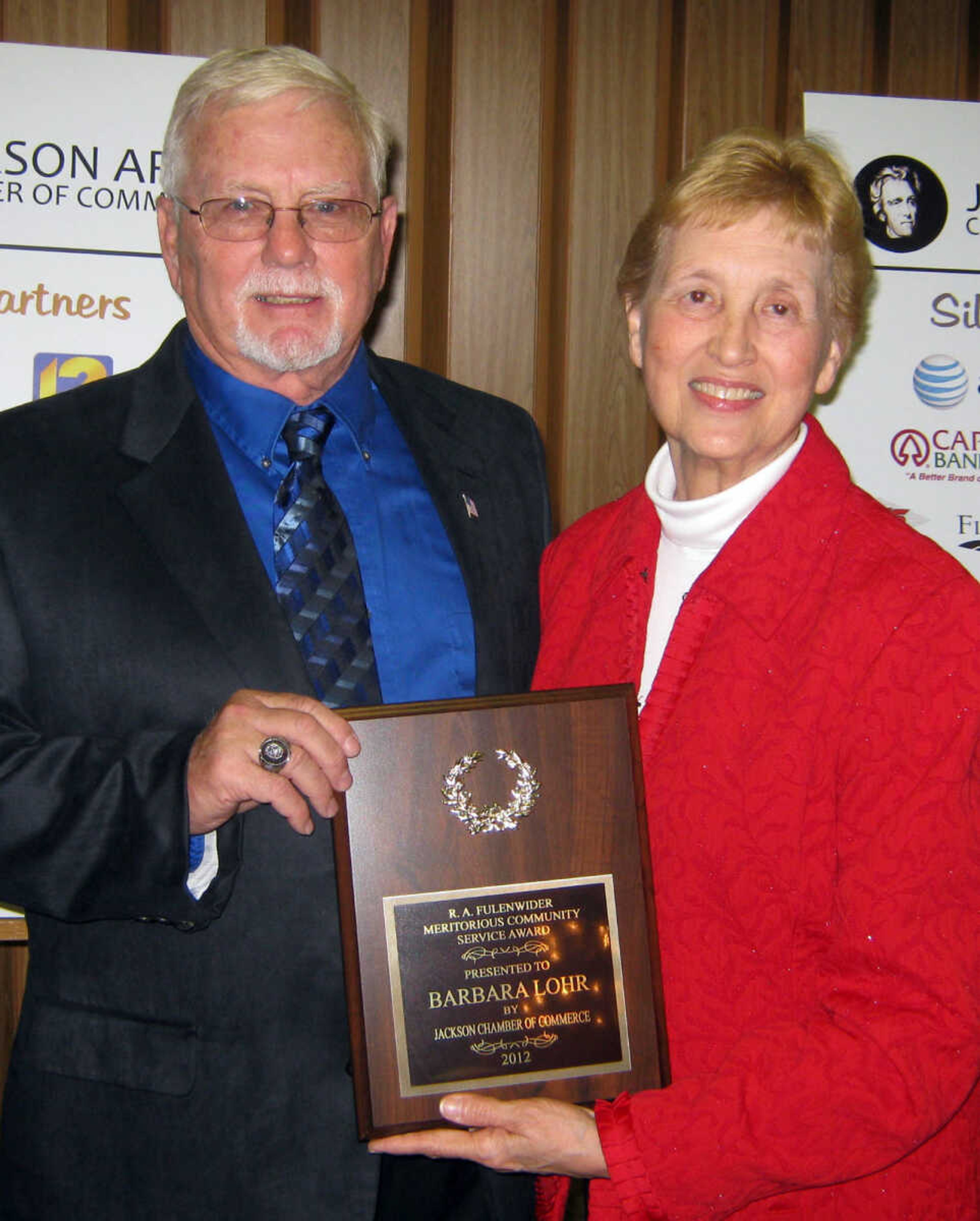 Jackson alderman David Hitt presents the R.A. Fulenwider Meritorious Community Service Award to Jackson Mayor Barbara Lohr, Jan. 11, at the Jackson Area Chamber of Commerce annual awards banquet at the Knights of Columbus Hall in Jackson, Mo.