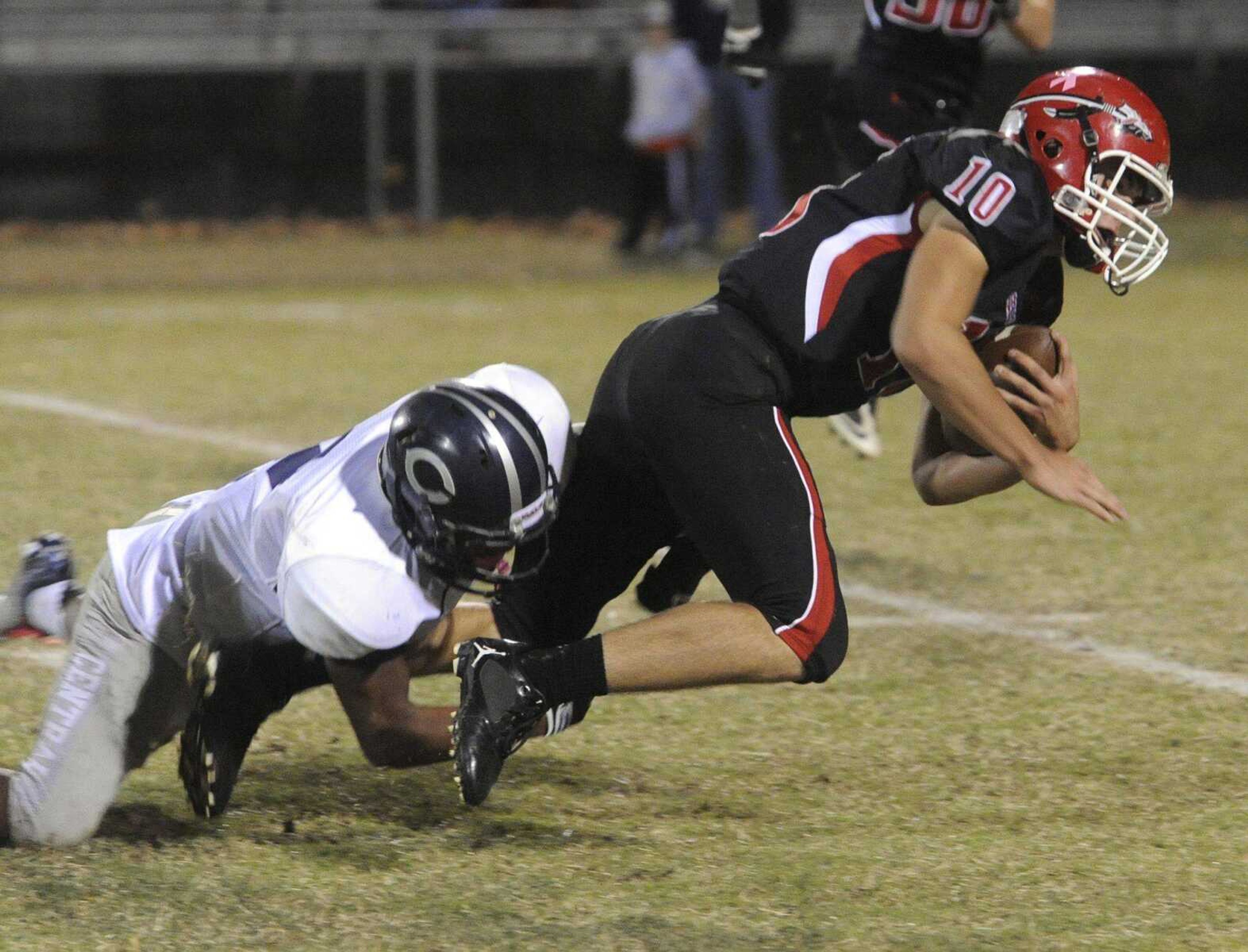 Jackson's Ty Selsor is tackled by Francis Howell Central's Justin Hayden during the second quarter Friday, Oct. 19, 2012 in Jackson. (Fred Lynch)