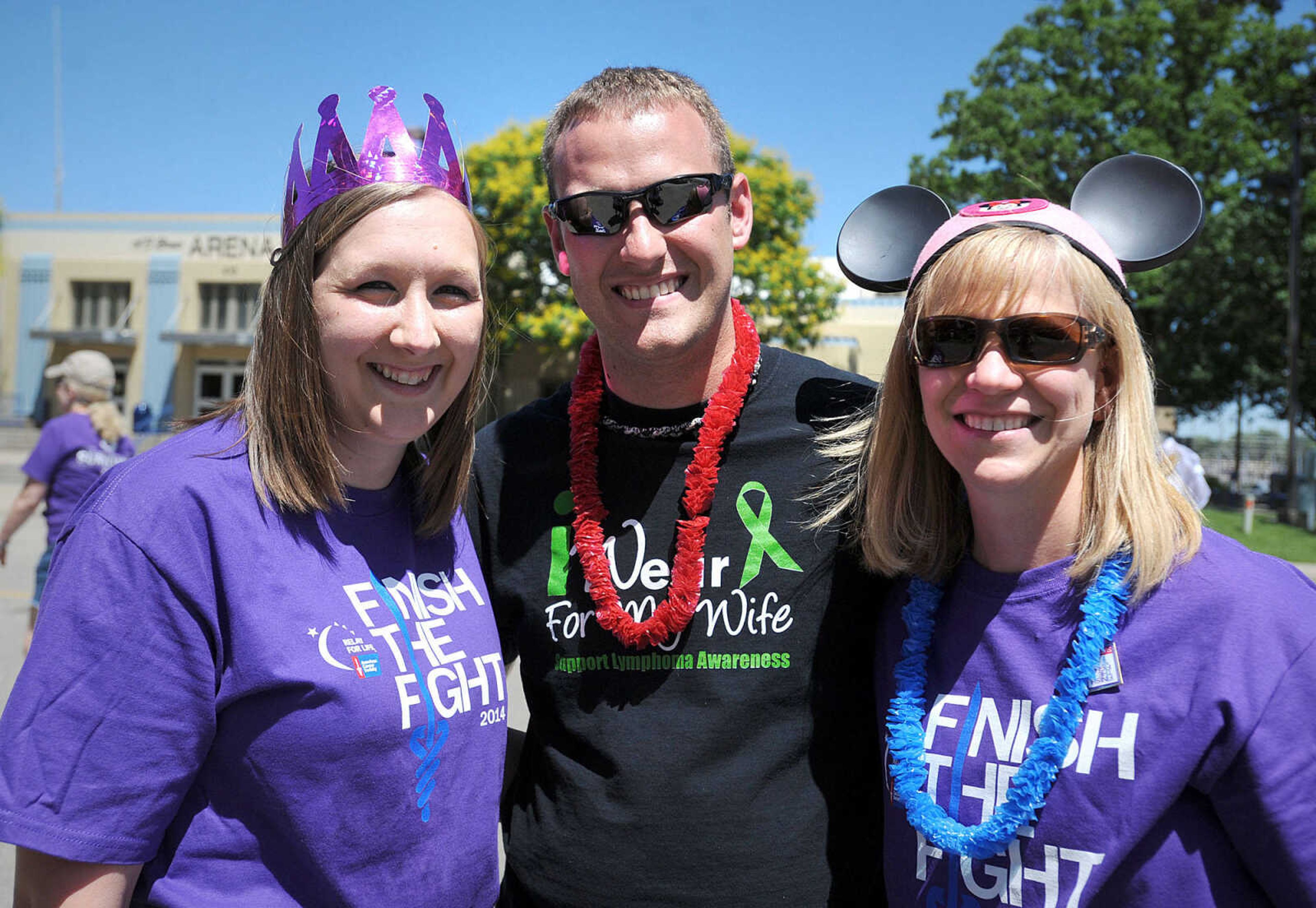 LAURA SIMON ~ lsimon@semissourian.com

Renee, left, and Matt Scroggins and Beth Brotherton pose for a photo, Saturday, June 14, 2014, during the Relay for Life of Cape Girardeau County fundraiser at Arena Park.