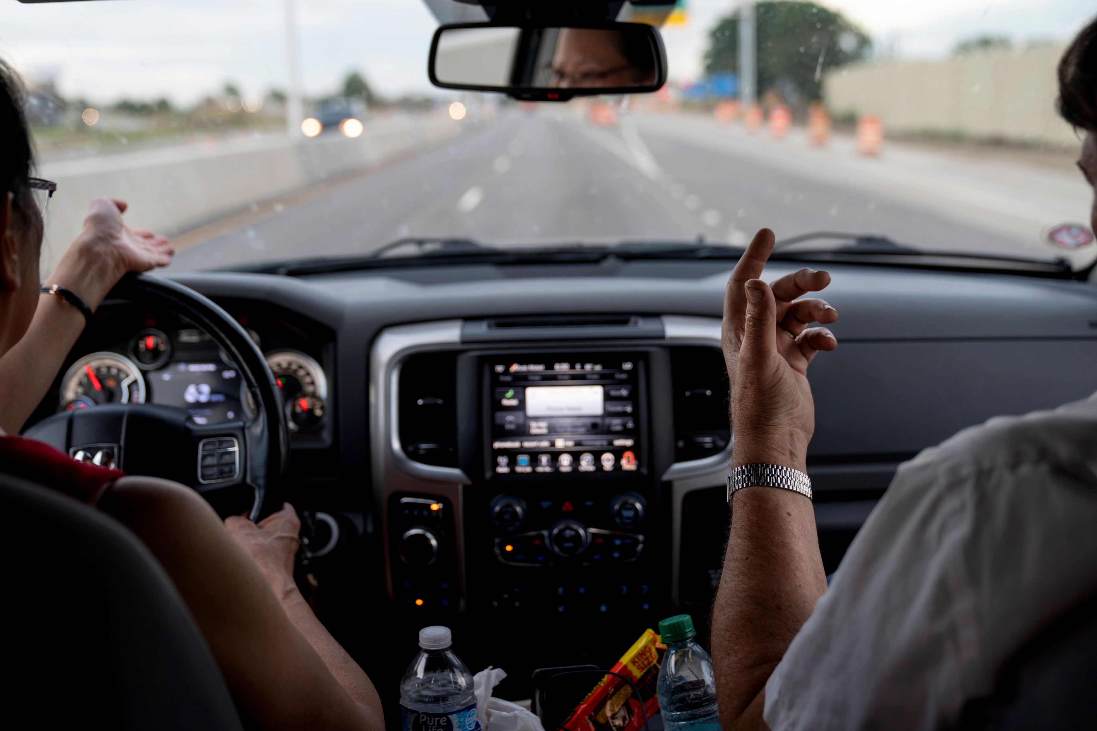 Husband and wife, Lesley, left, and Matt Dzik, argue about abortion as they drive through Champaign County, Ill., Saturday, Sept. 21, 2024. Sometimes for the Dziks knowing when to end the conversation is more important than winning it. “He’s not good at stopping but I’m getting better at walking away,” said Lesley. (AP Photo/David Goldman)