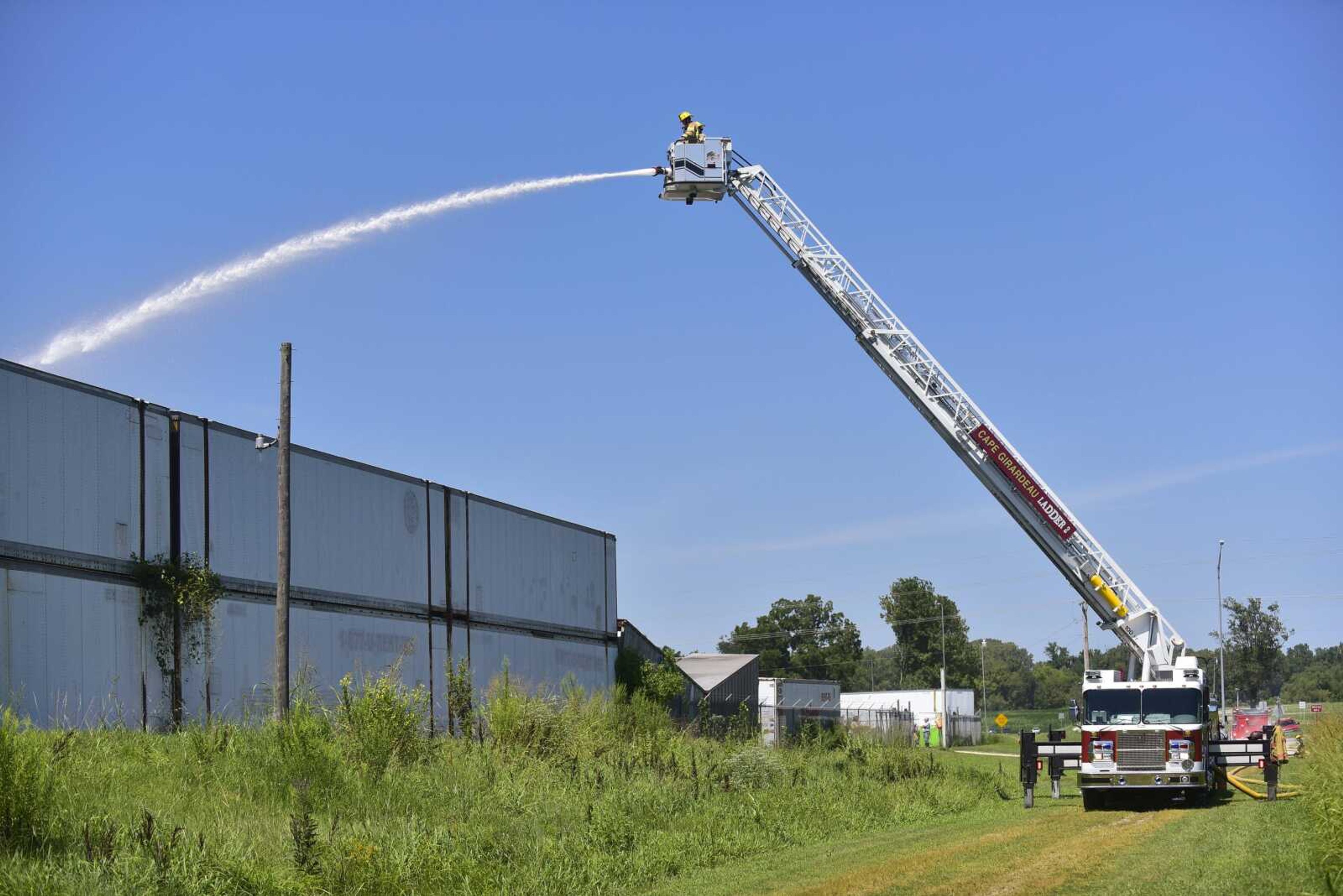 The Cape Girardeau Fire Department hoses down a fire Thursday at Cape Metal Recycling.