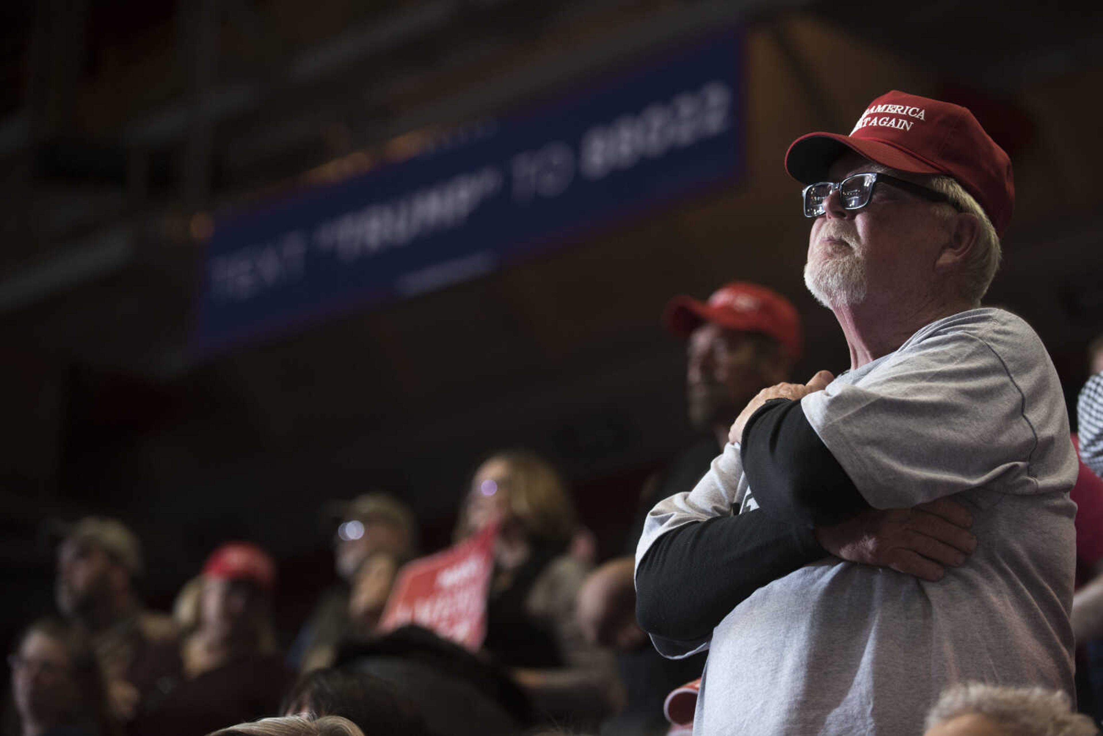 A rally attendee listens to President Donald Trump's speech at a Make America Great Again rally Monday, Nov. 5, 2018, at the Show Me Center in Cape Girardeau.