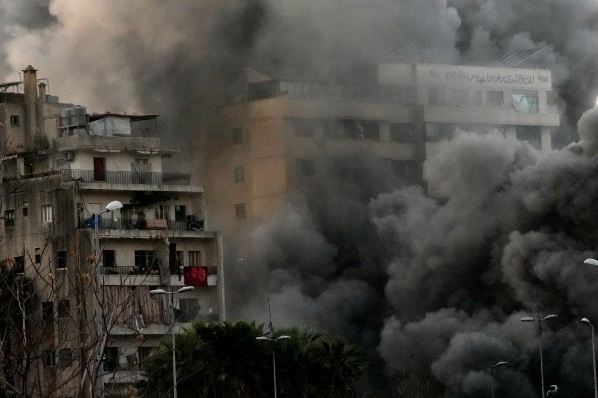 Photos of a central Beirut district struck by Israeli bombs